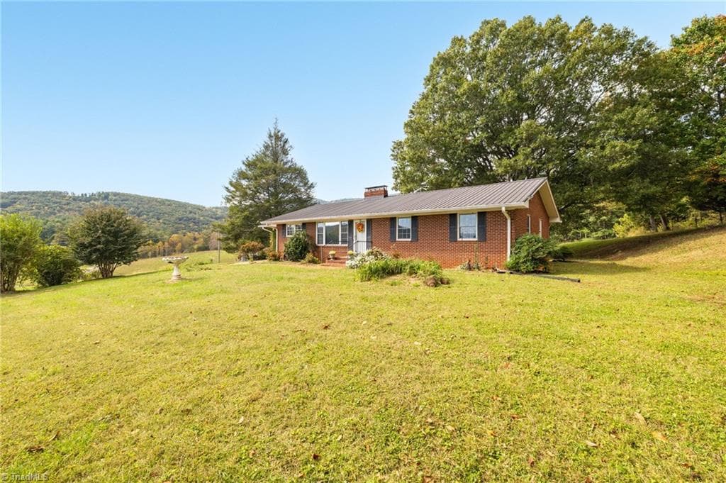 Stick/Site Built at 1465 Ramey Creek Road, Lowgap NC 27024, photo 2 of 49