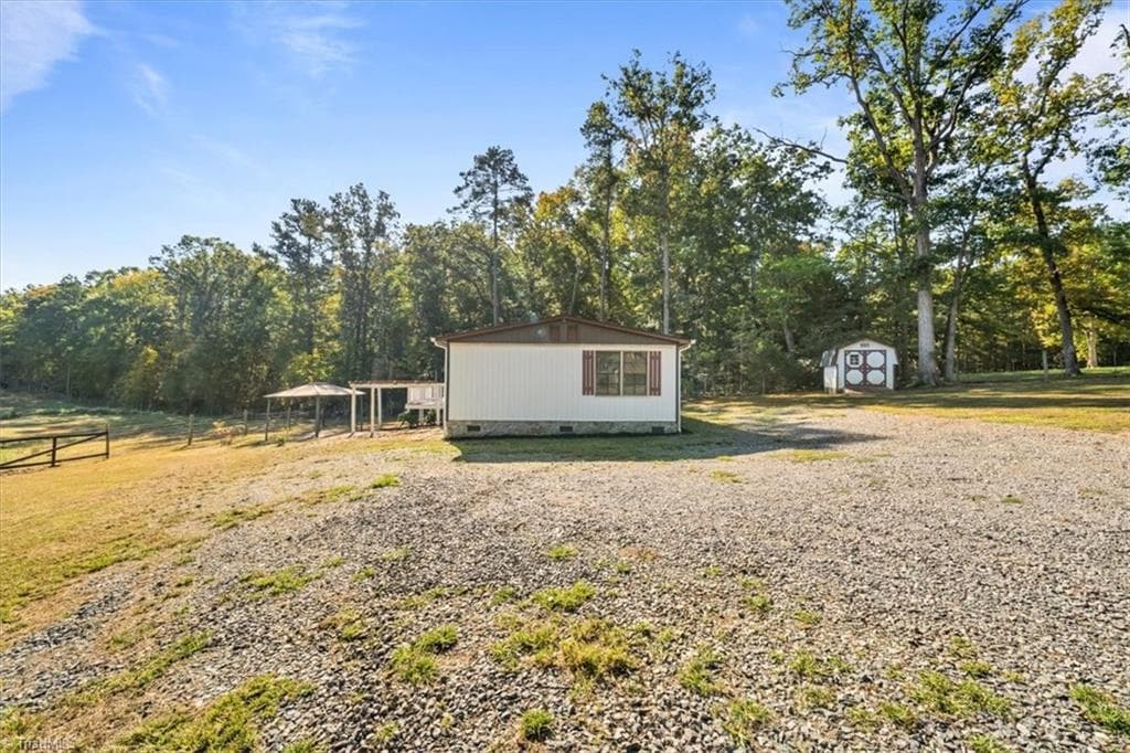 Manufactured Home at 7775 Riverside Road, Seagrove NC 27341, Seagrove, photo 32 of 43