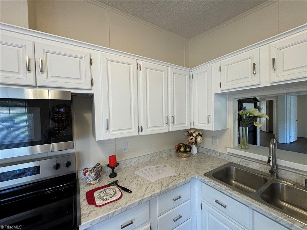 Manufactured Home at 1376 Harris Road, Walnut Cove NC 27052, Walnut Cove, photo 16 of 45