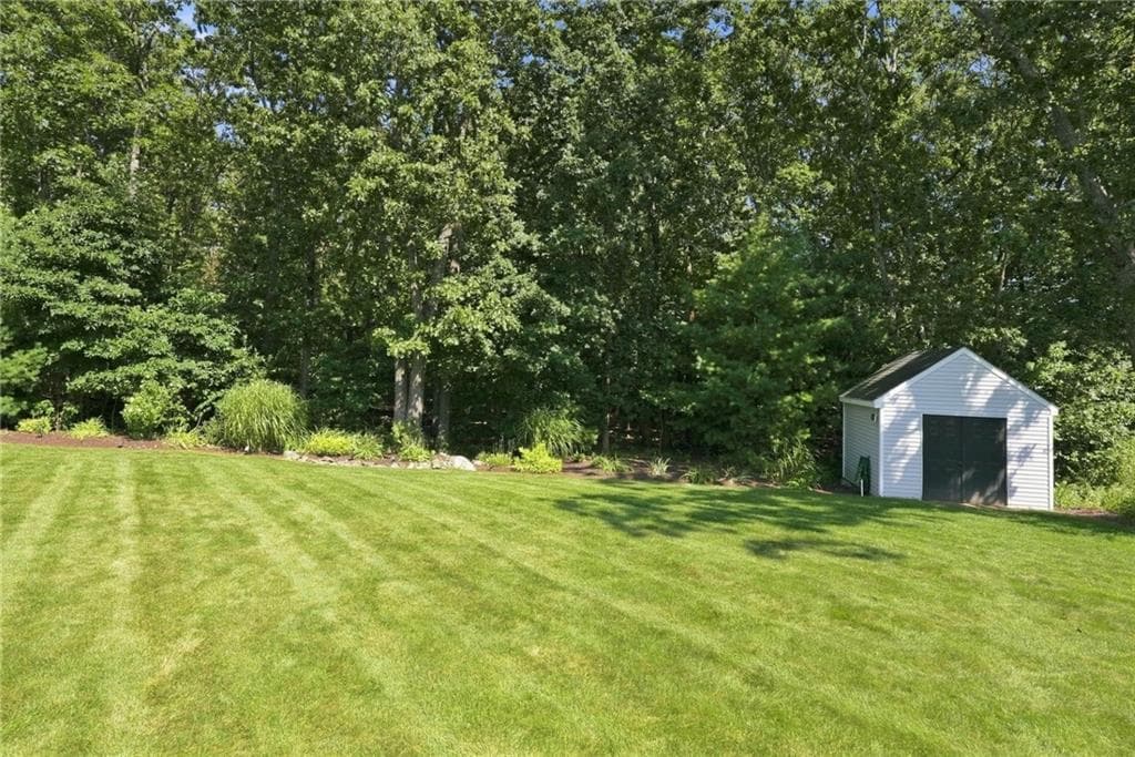 Single Family Residence at 114 Teakwood Drive W, Coventry, photo 36 of 50