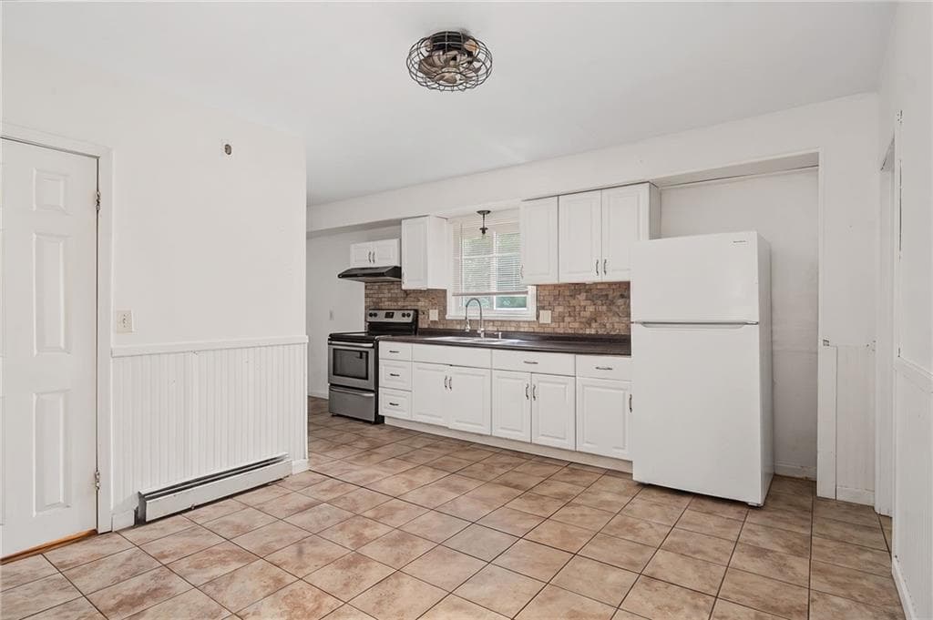 Multi Family at 84 Saint Paul Street, North Smithfield, photo 13 of 47