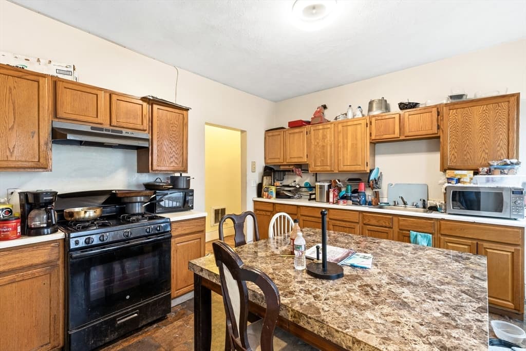 3 Family at 1023-A Blue Hill Ave, Boston MA 02124, photo 6 of 24