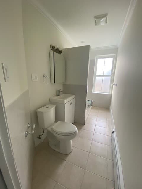 3 Family at 251 Cambridge, Boston MA 02134, photo 3 of 12