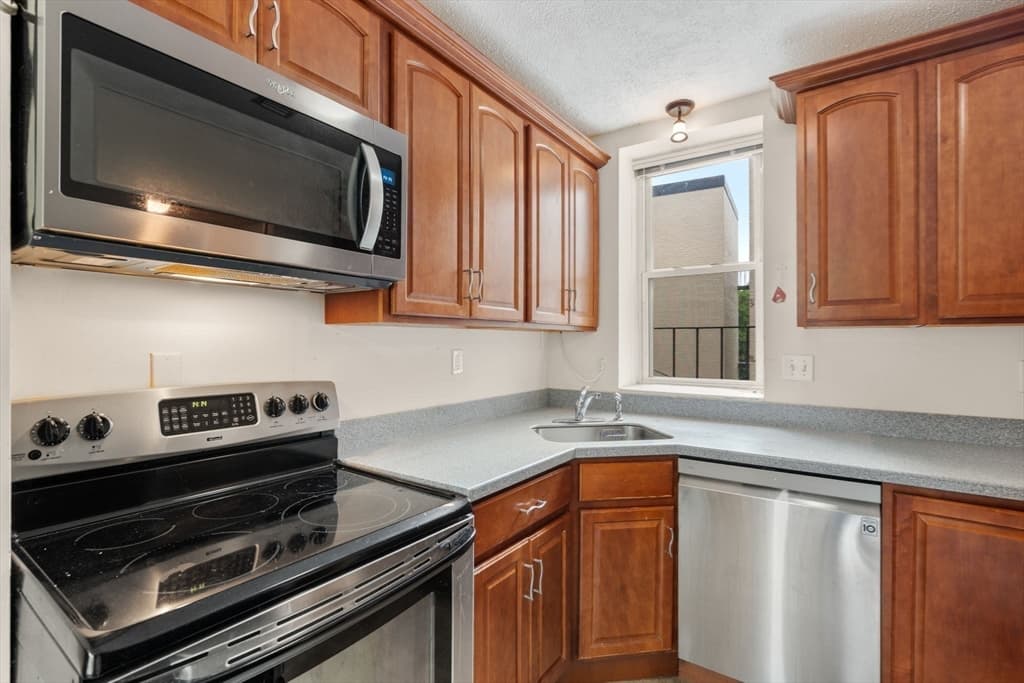 Condominium at 1419 Commonwealth Ave. # 404, Boston MA 02135, photo 3 of 12