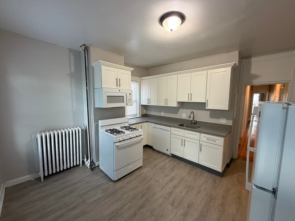 3 Family at 55 Spencer Street, Boston MA 02124, Boston, photo 4 of 9