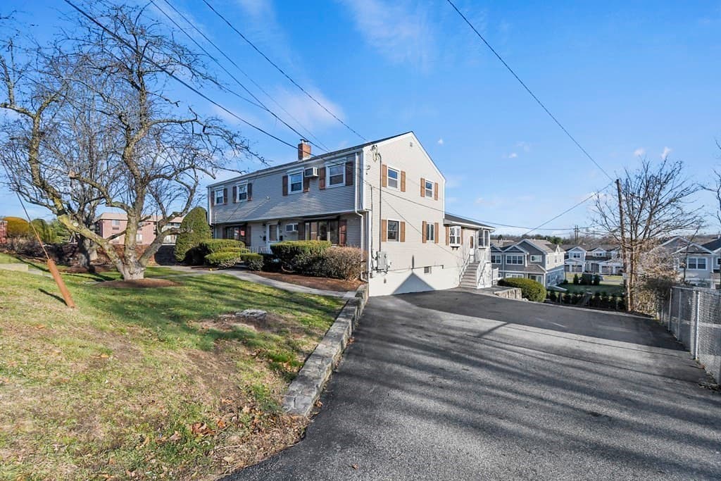 Attached (Townhouse/Rowhouse/Duplex) at 72 Cambridge Road # 2, Woburn MA 01801, photo 31 of 31