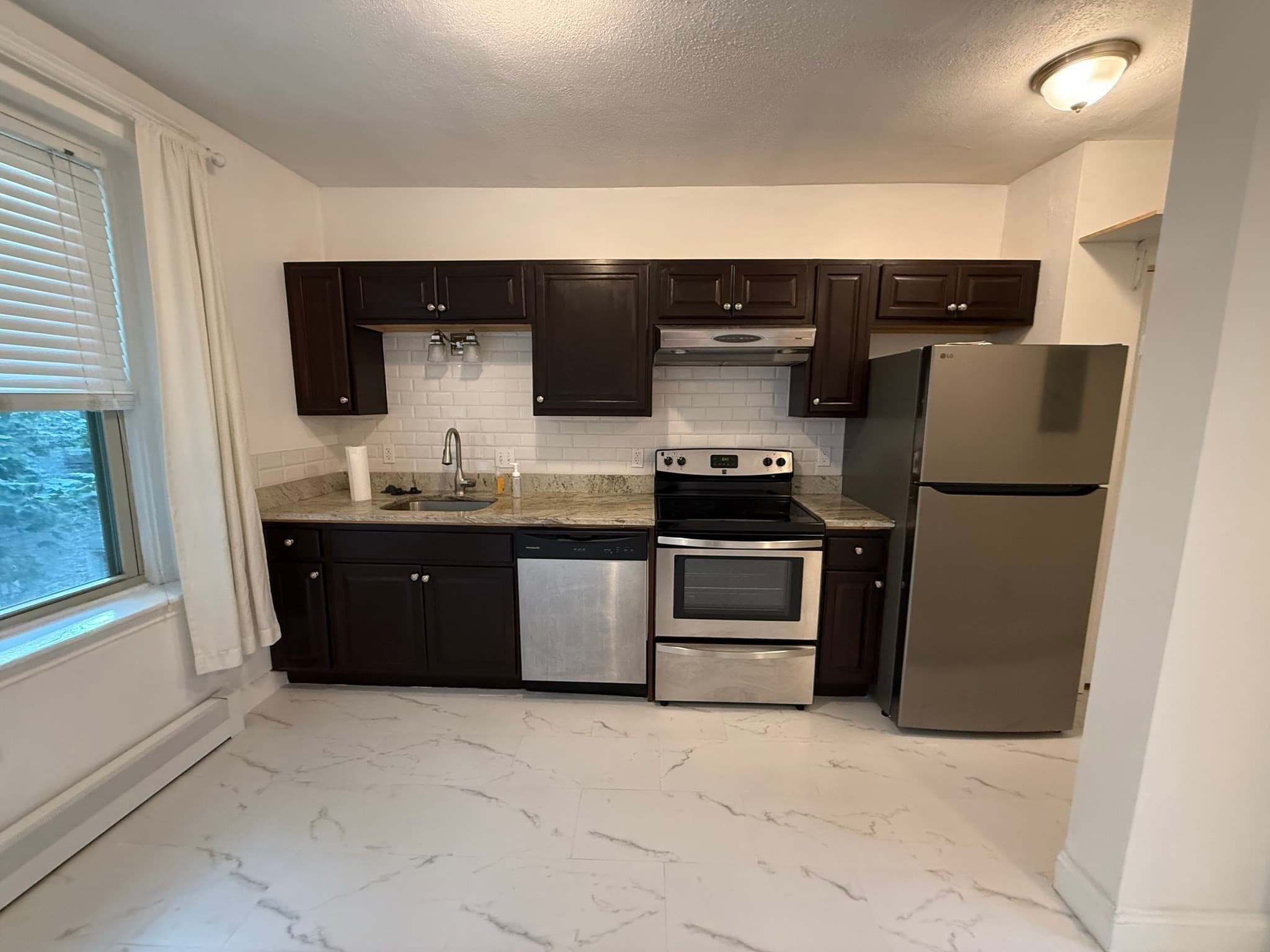 Condominium at 32 Ransom Rd # 11, Boston MA 02135, Boston, photo 5 of 8