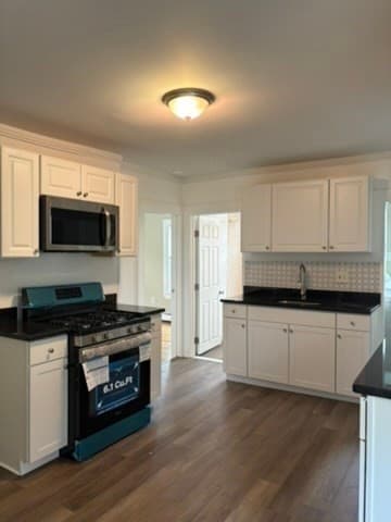 3 Family at 10 Rockdale Ave, Lowell MA 01854, Lowell, photo 9 of 36