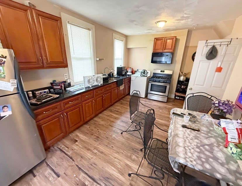 4 Family at 12 Columbus Ave, Lowell MA 01851, photo 4 of 13