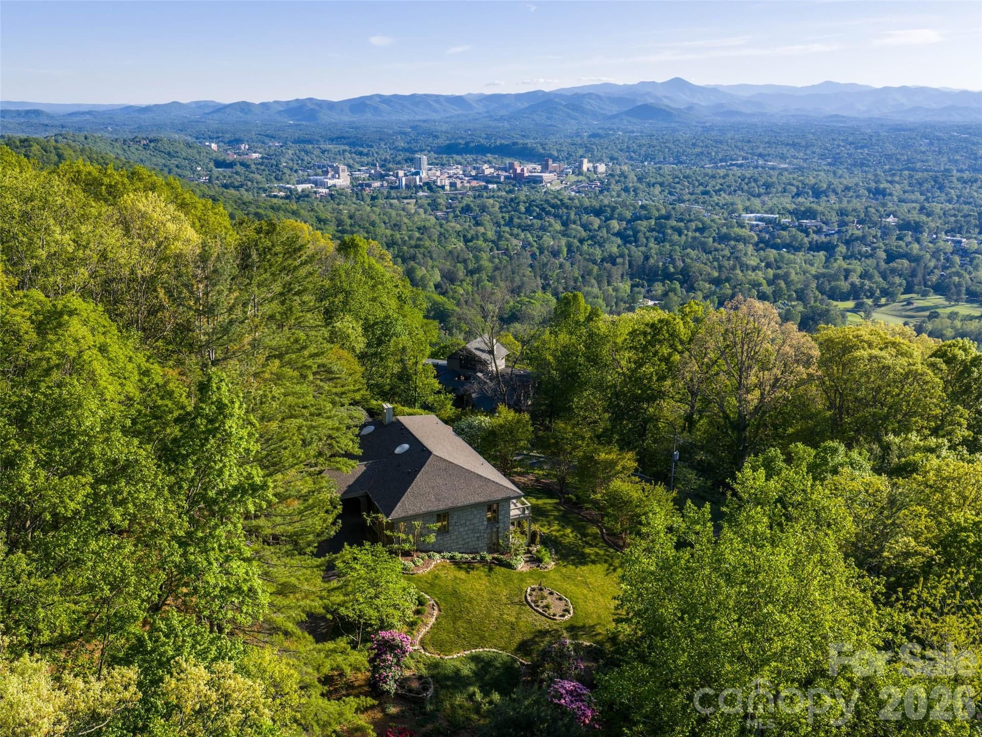 Minutes from downtown Asheville, this timeless mountain home offers privacy, beauty, and breathtaking views - 65 Crestwood Road, Asheville