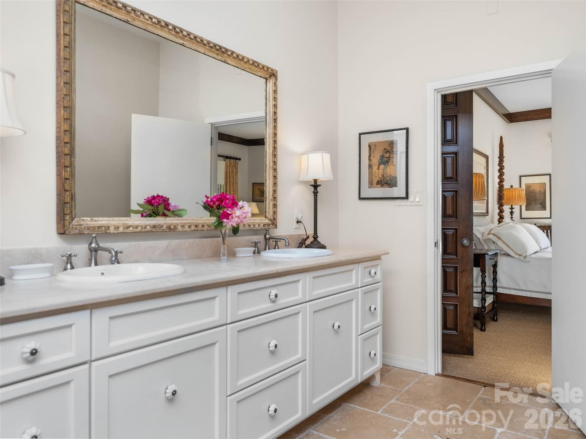 Elegant bath retreat just beyond the four-poster bedroom, designed with timeless detail and warmth. - 65 Crestwood Road, Asheville