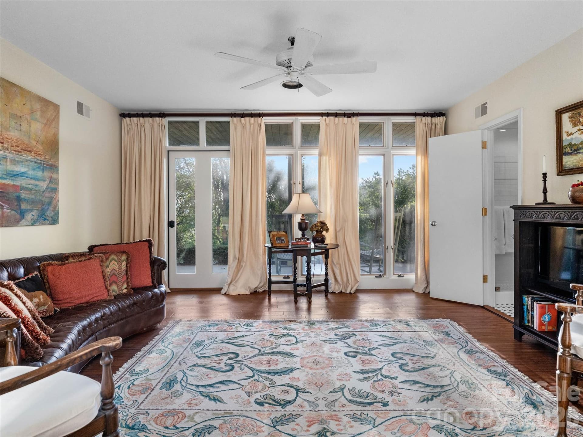 A comfortable shared den opens directly onto the porch and patio gardens - 65 Crestwood Road, Asheville