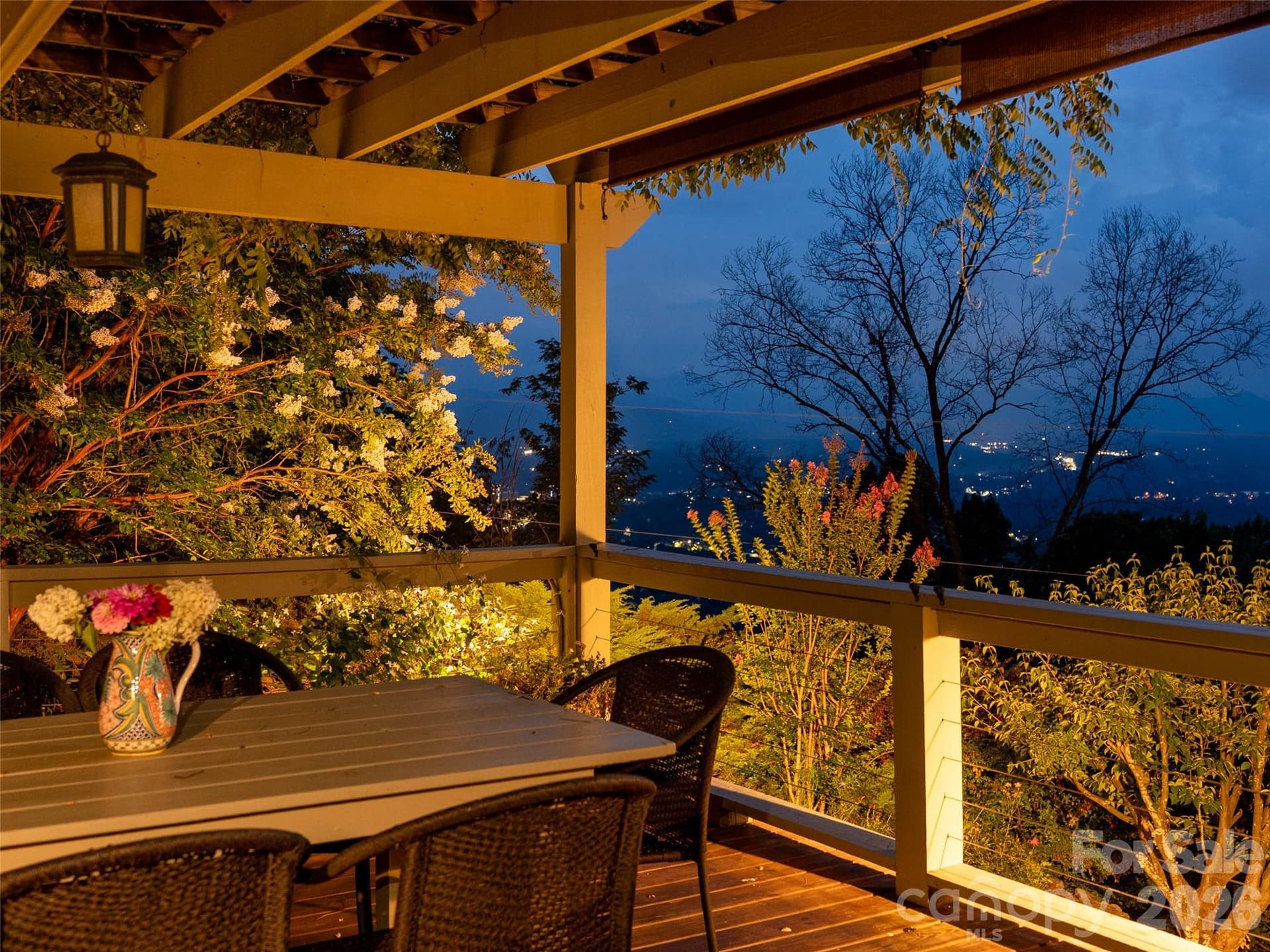 The evening glows from the side porch and city view - 65 Crestwood Road, Asheville