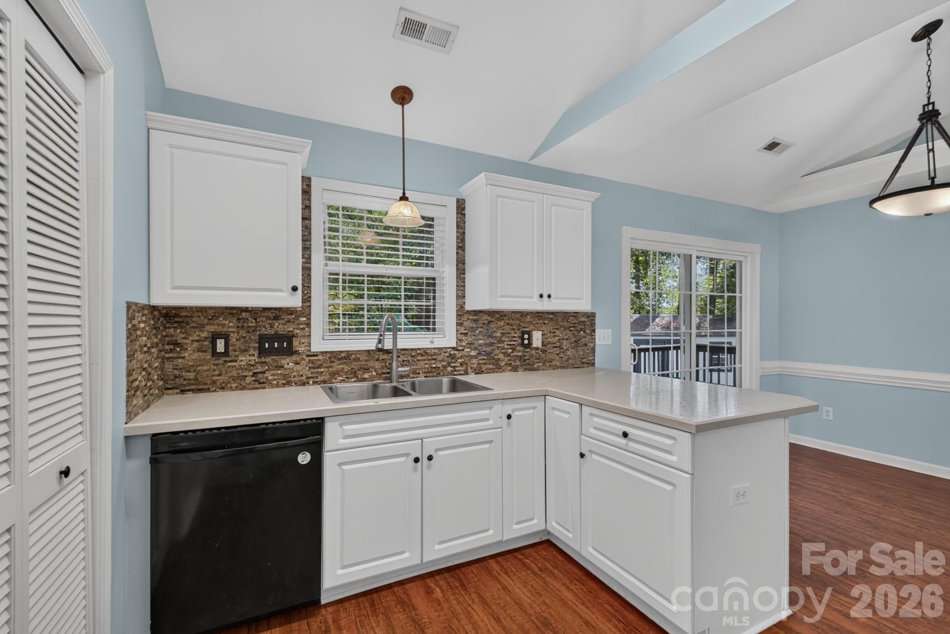Open kitchen layout keeps you connected to the dining and main living areas. - 702 Painted Lady Court, Rock Hill