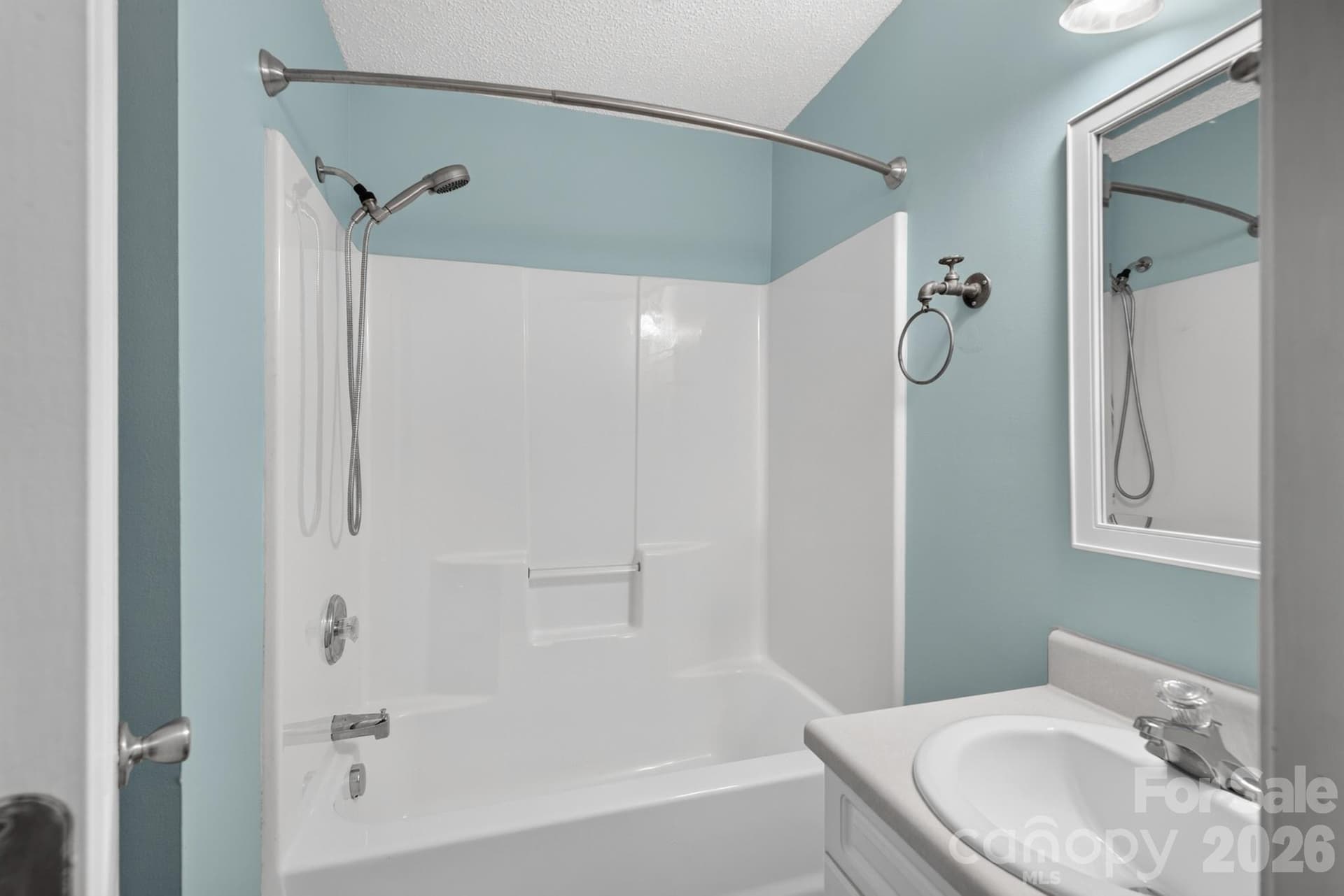 Clean full bathroom equipped with a tub/shower combination. - 702 Painted Lady Court, Rock Hill
