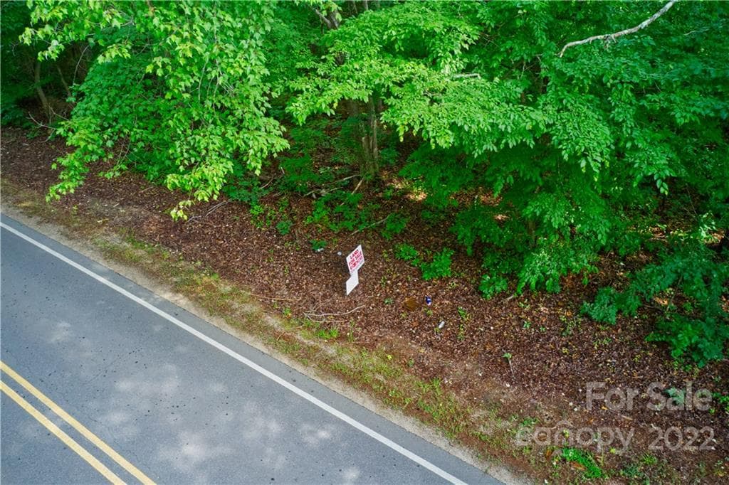 Abundant Road Frontage; Realtor Signage - Matthews