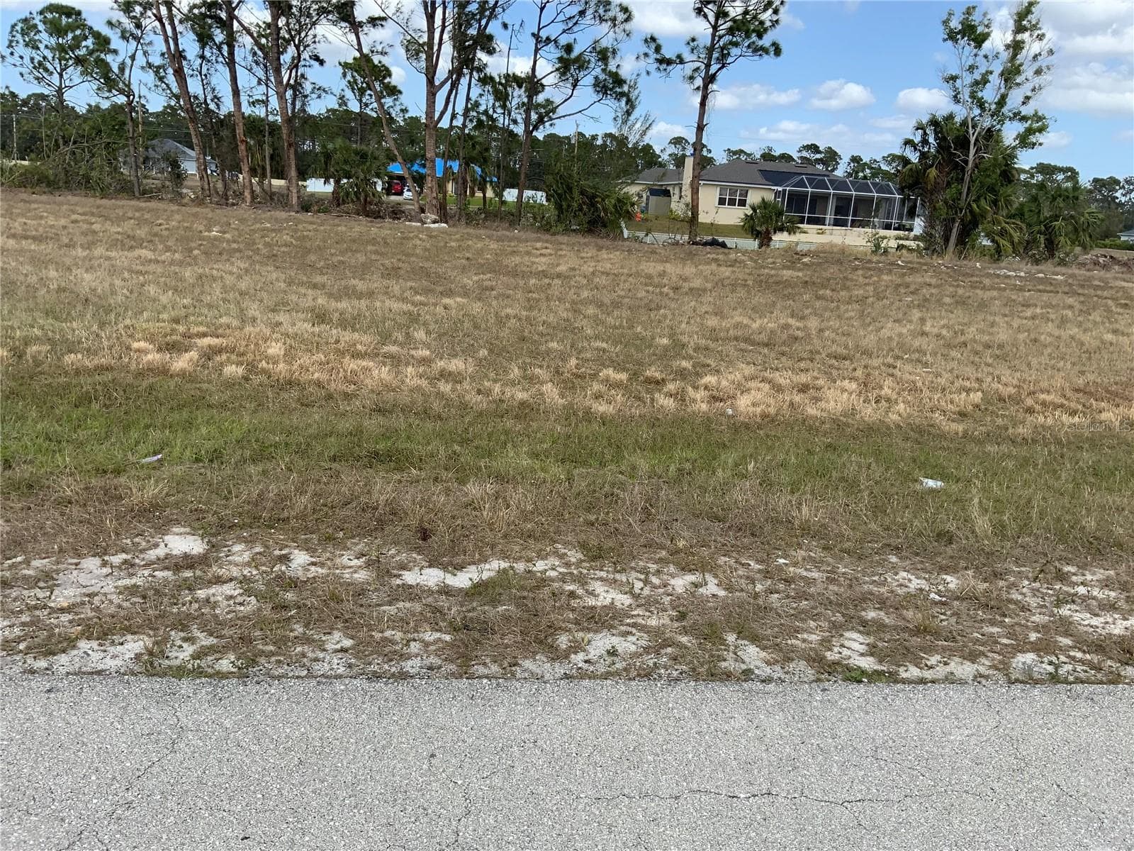 View from Street - 323 NE 31ST ST, CAPE CORAL