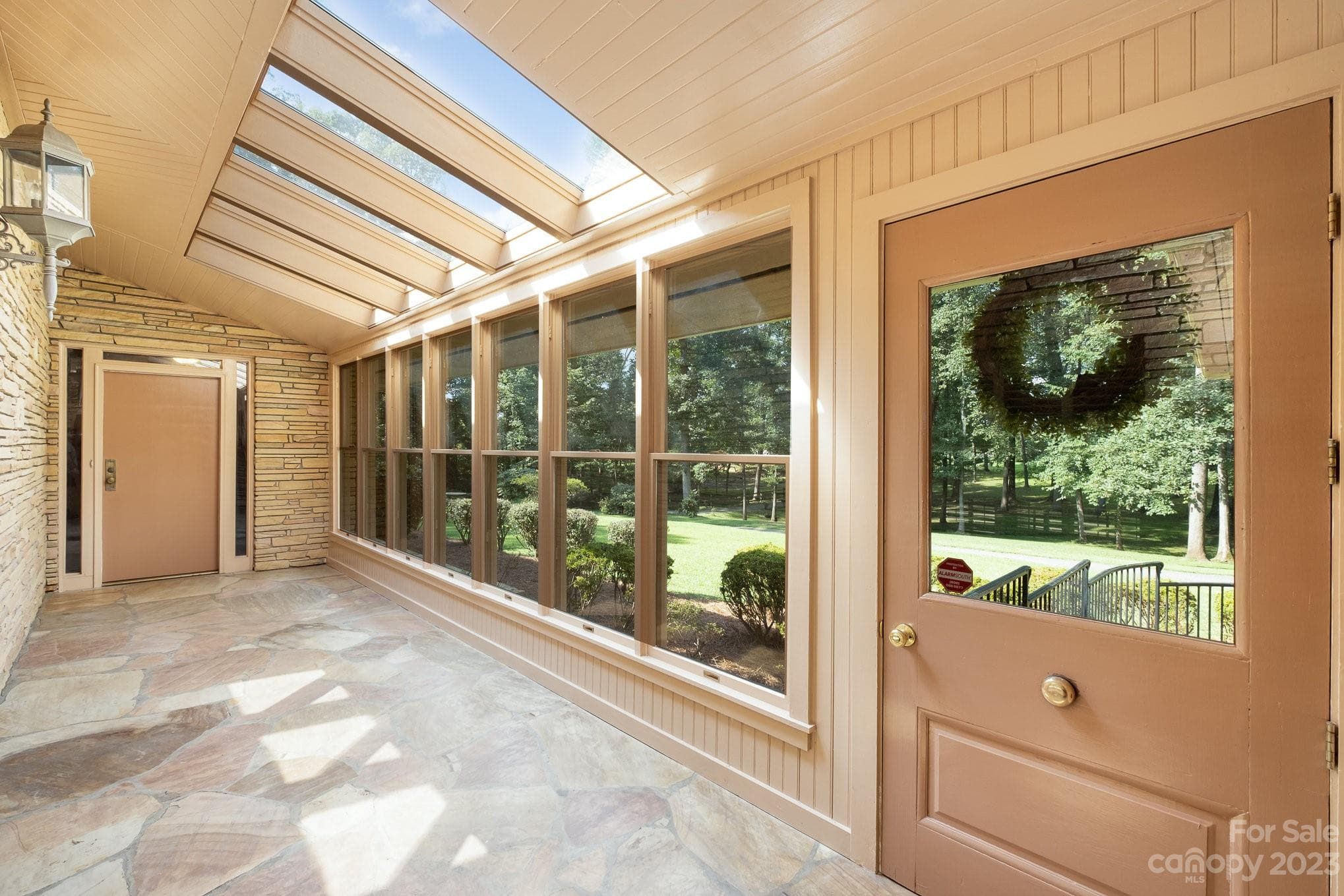 Incredible entrance from front door to front door. Stone floor, windowed skylighted entrance. - 2756 Peachtree Road, Statesville