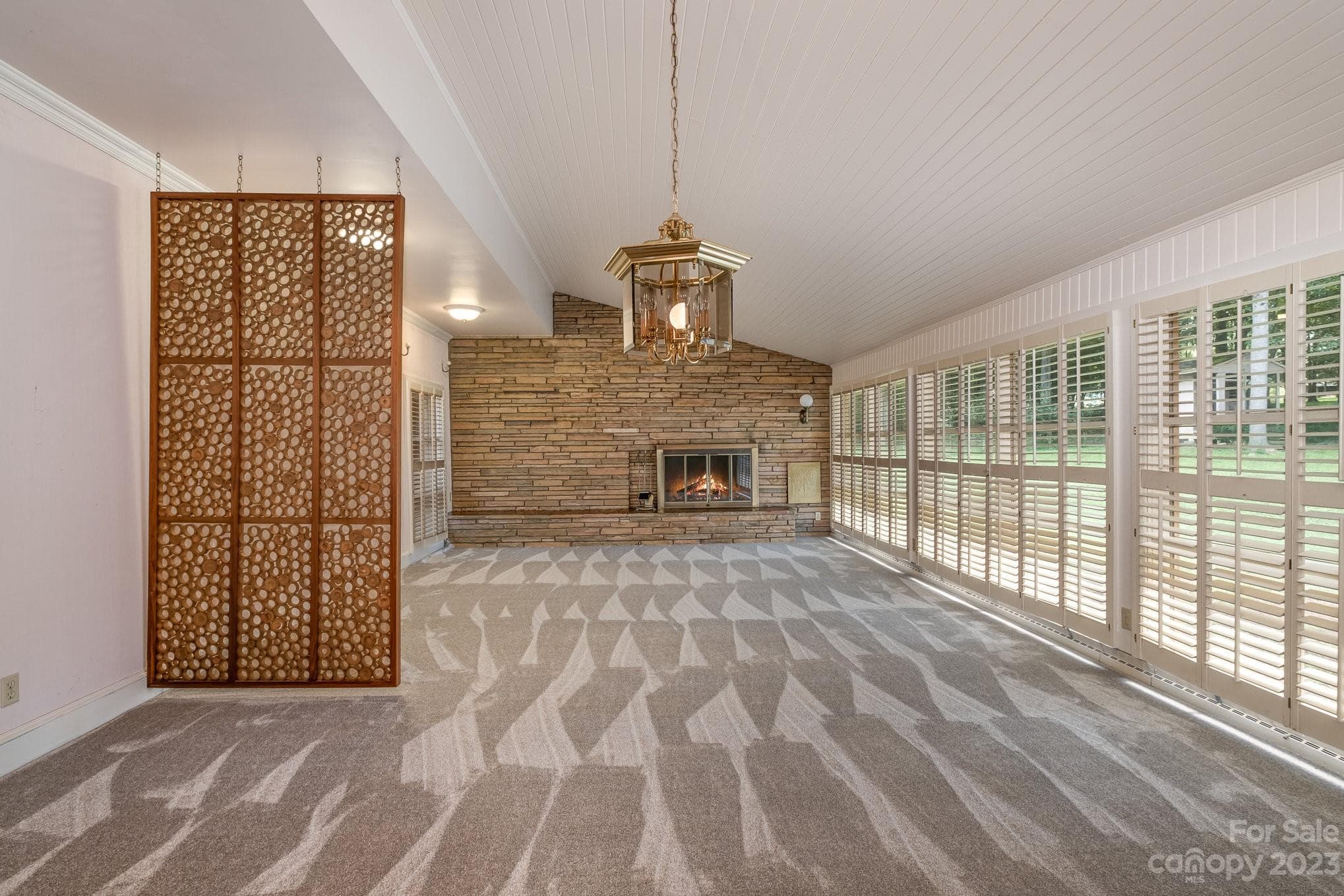 View of Living room/ Dining room area - beautiful, natural artwork. - 2756 Peachtree Road, Statesville