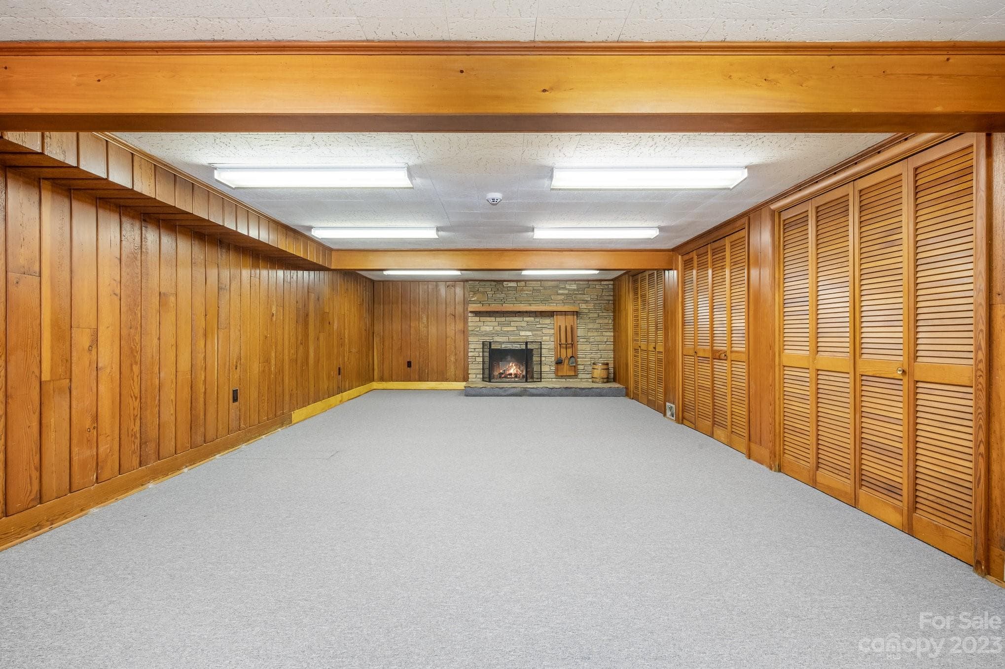 Fabulous basement recreation room with stone fireplace - 2756 Peachtree Road, Statesville