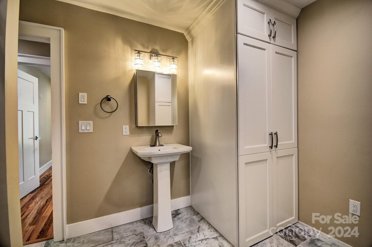 Laundry Center with Full Size Stacked Maytag Washer/Dryer - Porcelain Tile Floors - Kohler Pedestal Sink & Mirrored Medicine Cabinet - Woodlands Village, Maggie Valley