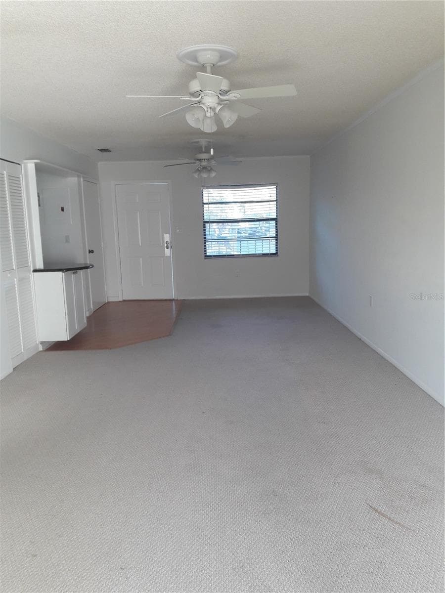 LR to DR view - 101 LAKE AVE NE #222, LARGO