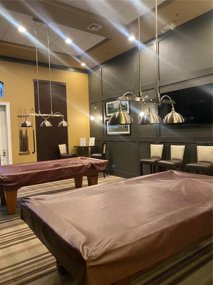 Clubhouse pool table room - 119 CRESCENT MOON DR, GROVELAND