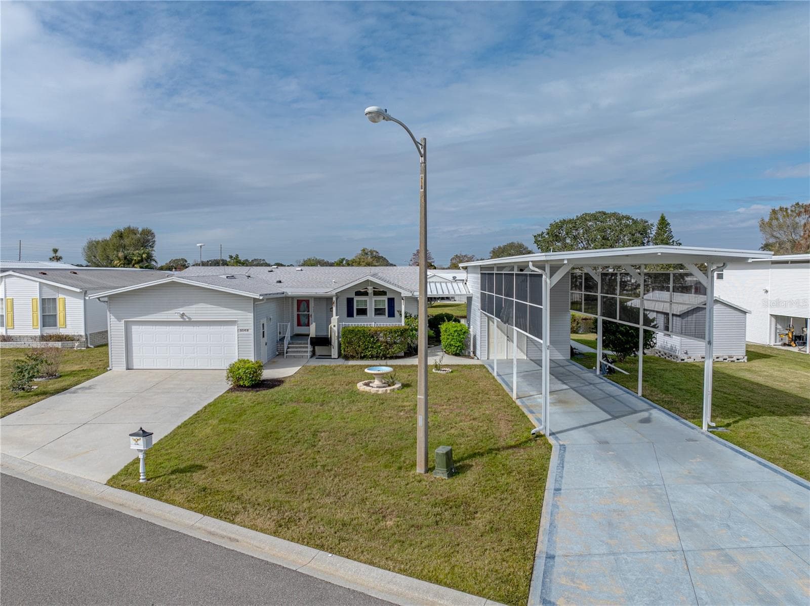 Manufactured Home at 5148 ISLAND VIEW CIR N, POLK CITY, photo 2 of 100