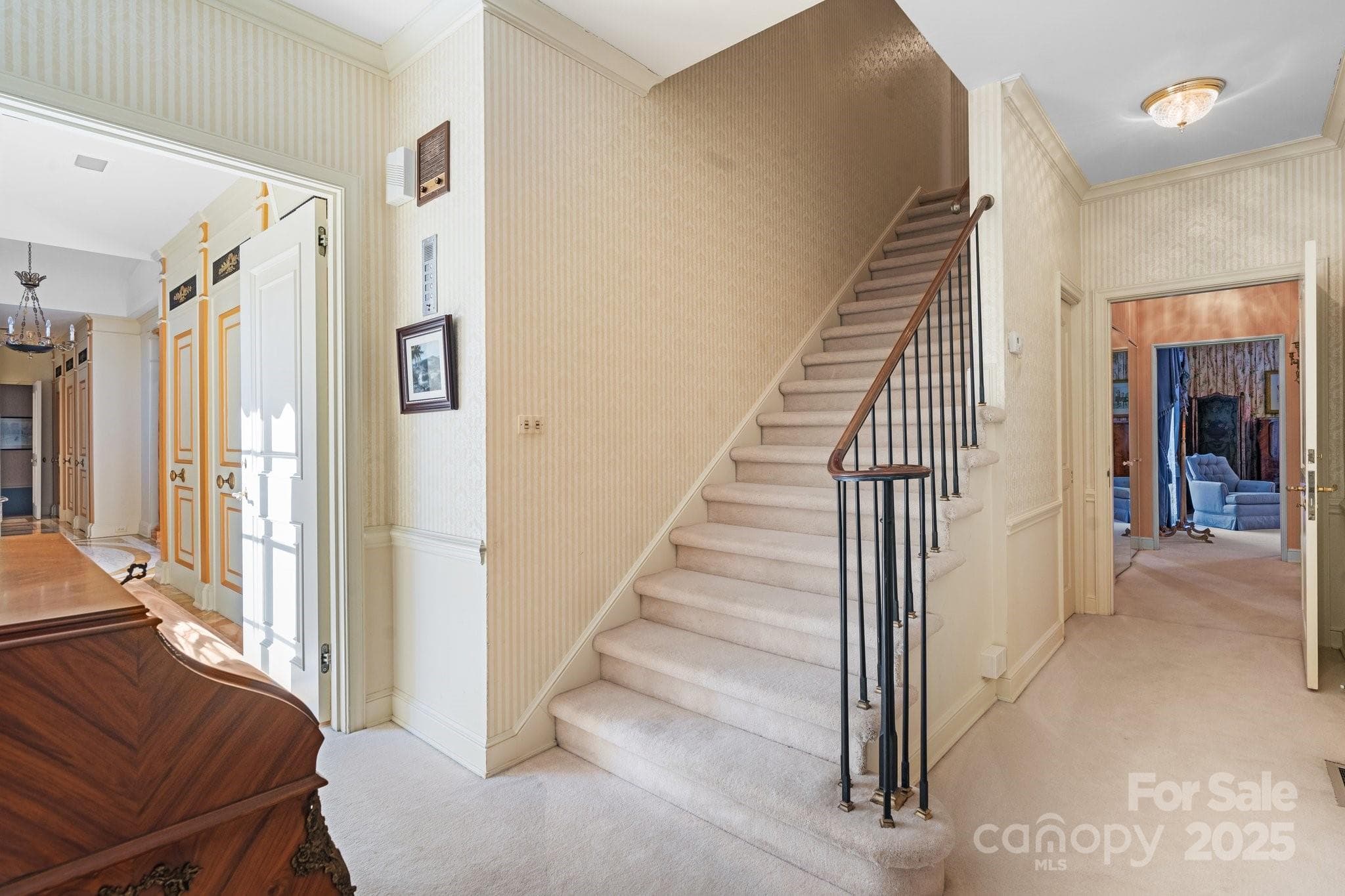 Hall to 2nd Primary Bedroom & Stairs to 2nd Level - Lenoir