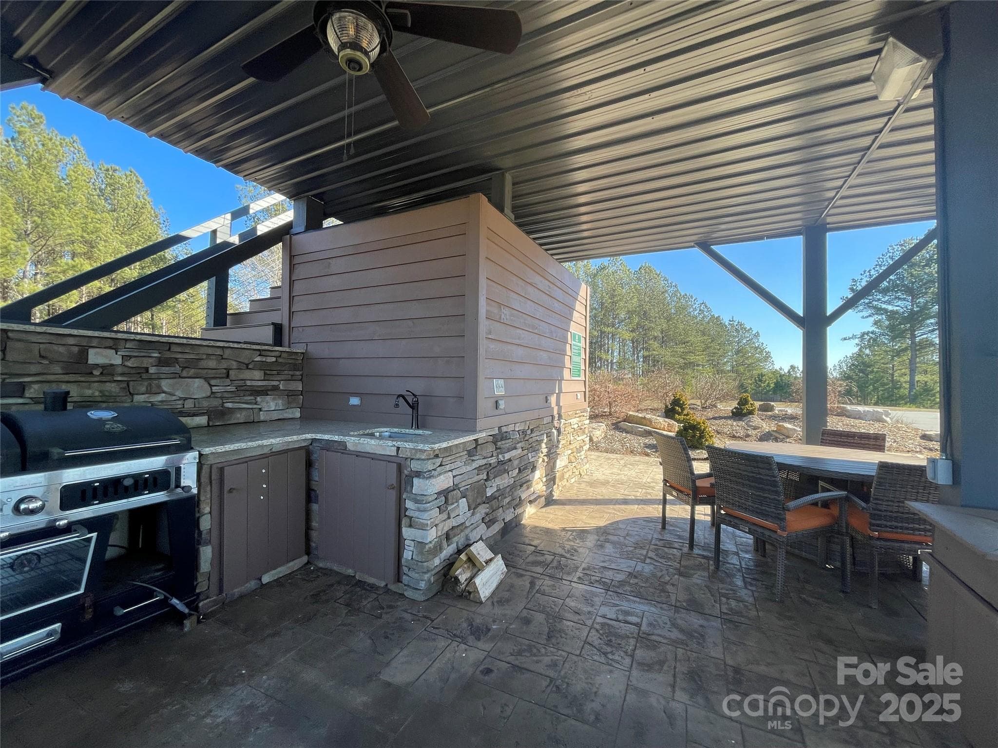 Grill location with underneath sitting area. - 109 Shortoff Trail, Valdese