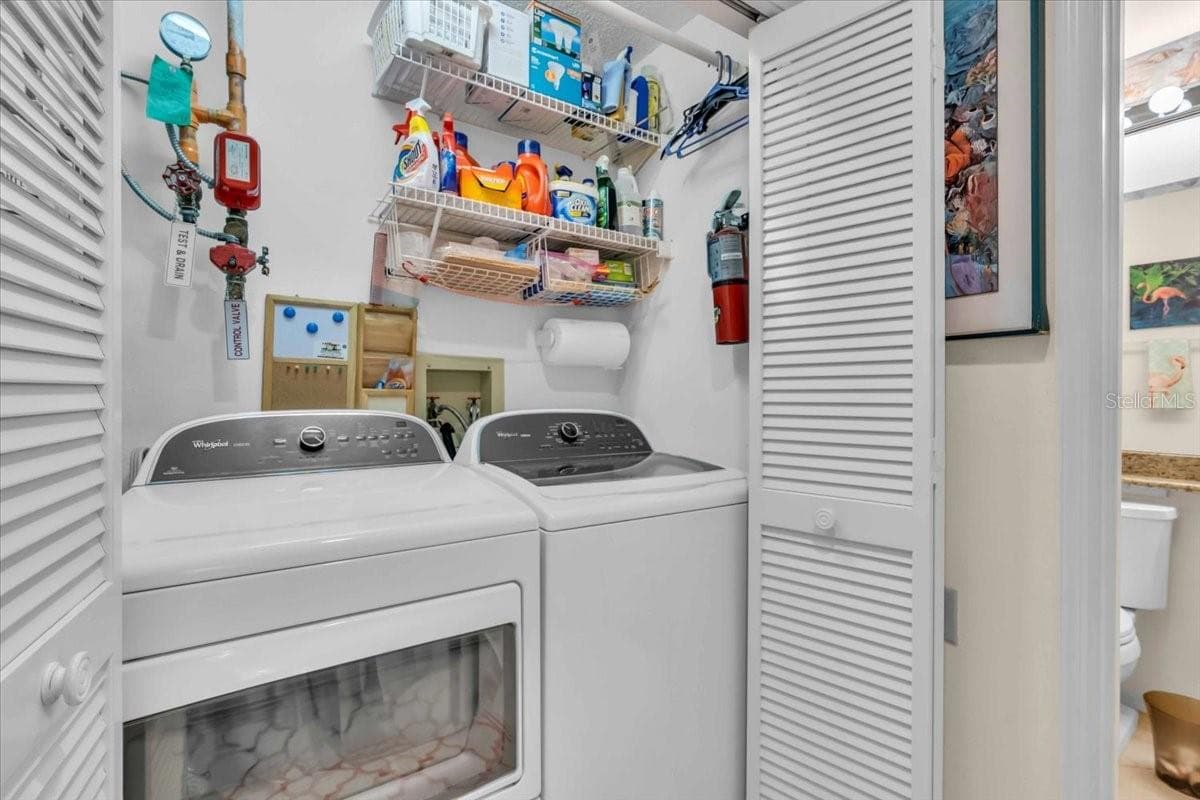laundry area - 6713 STONE RIVER RD #206, BRADENTON