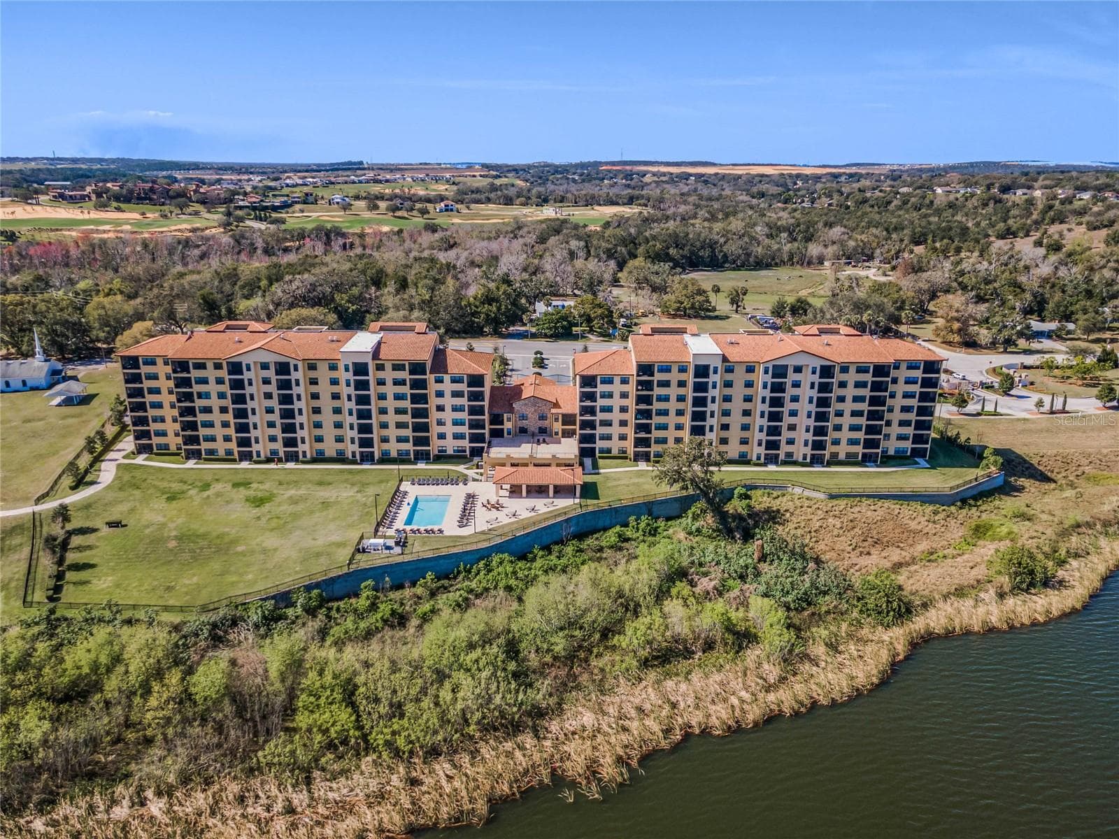 Back view of Siena overlooking Lake Siena. - 16300 COUNTY ROAD 455 #305, MONTVERDE