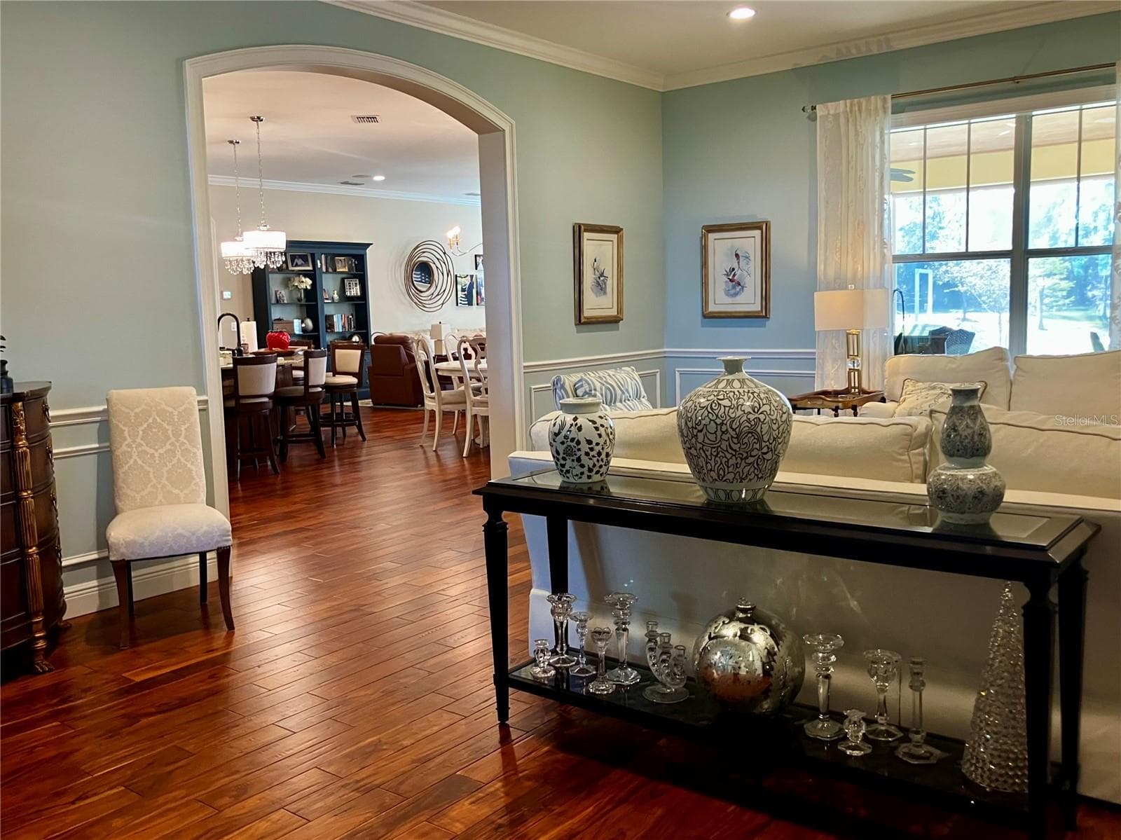 Living room with pond view, open to kitchen - 3709 GALLAGHER RD, PLANT CITY