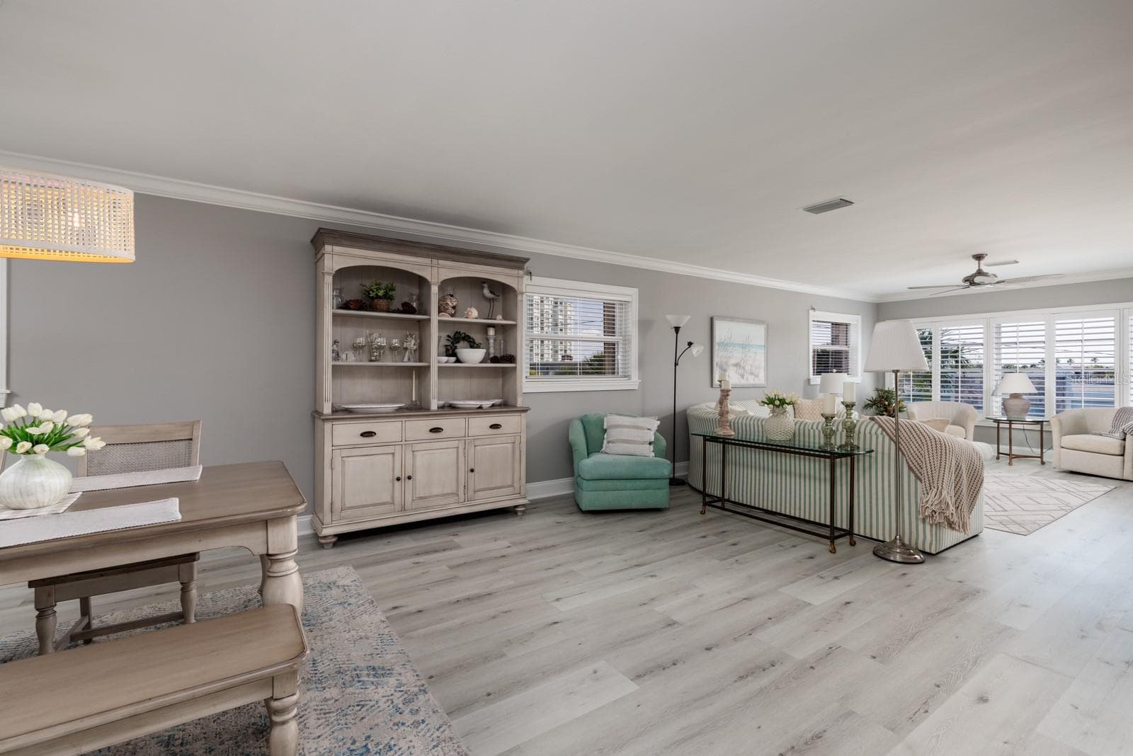 Dining/Living room areas. 3 side windows & large living room window. All windows have hurricane shutters. - 6161 GULF WINDS DR #338, ST PETE BEACH