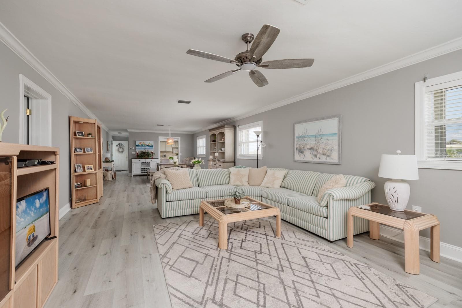 Living room. Sleeper sofa. Unit sold turnkey (fully furnished + everything else). - 6161 GULF WINDS DR #338, ST PETE BEACH