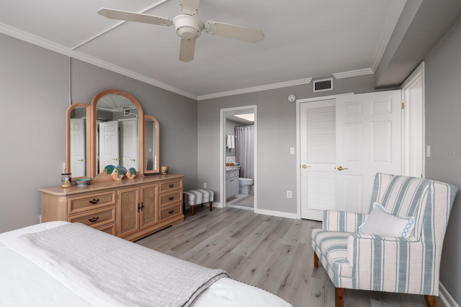 Primary bedroom w/En-suite bath & walk-closet on right. - 6161 GULF WINDS DR #338, ST PETE BEACH