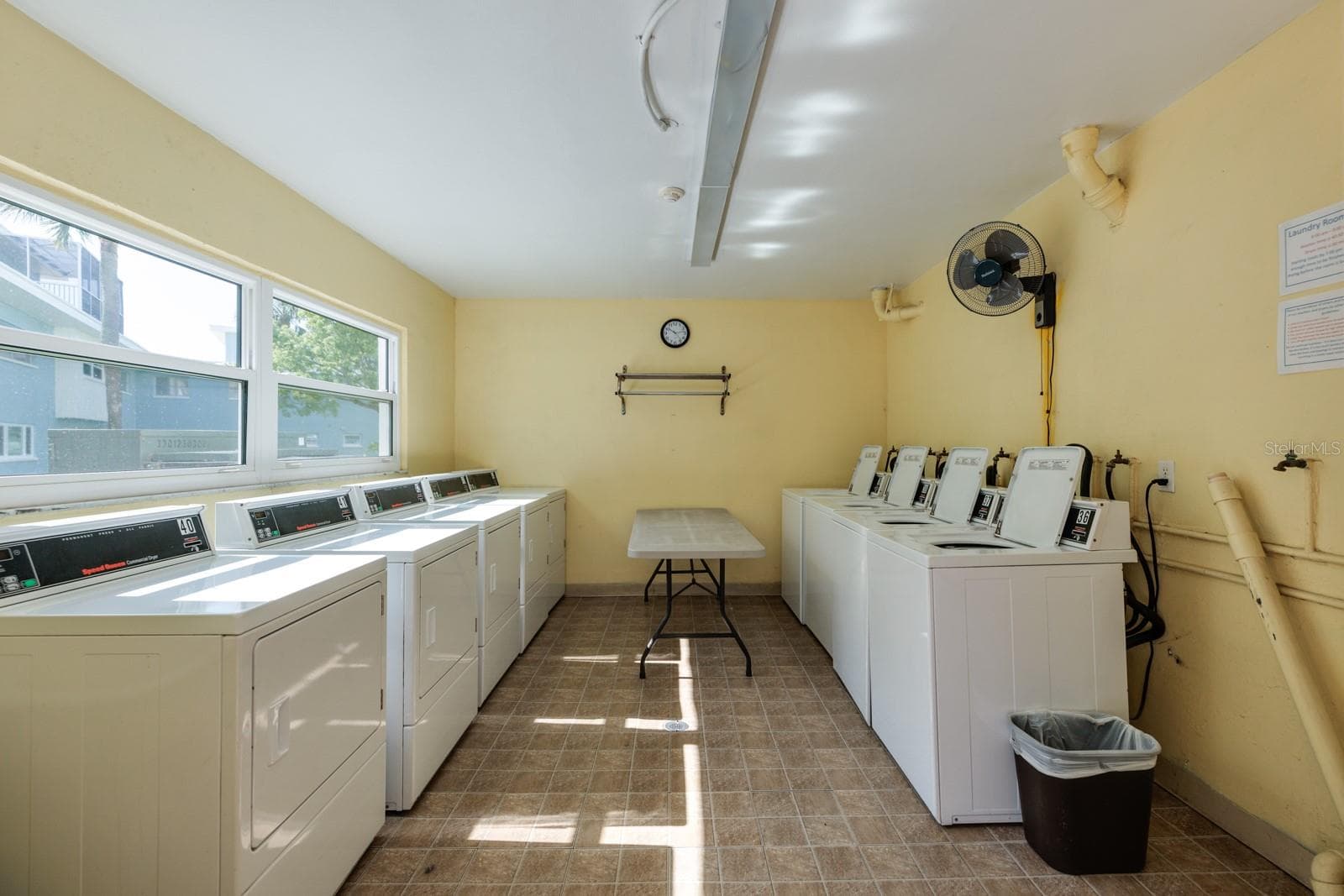 Laundry room on 1st floor in middle of bldg. - 6161 GULF WINDS DR #338, ST PETE BEACH