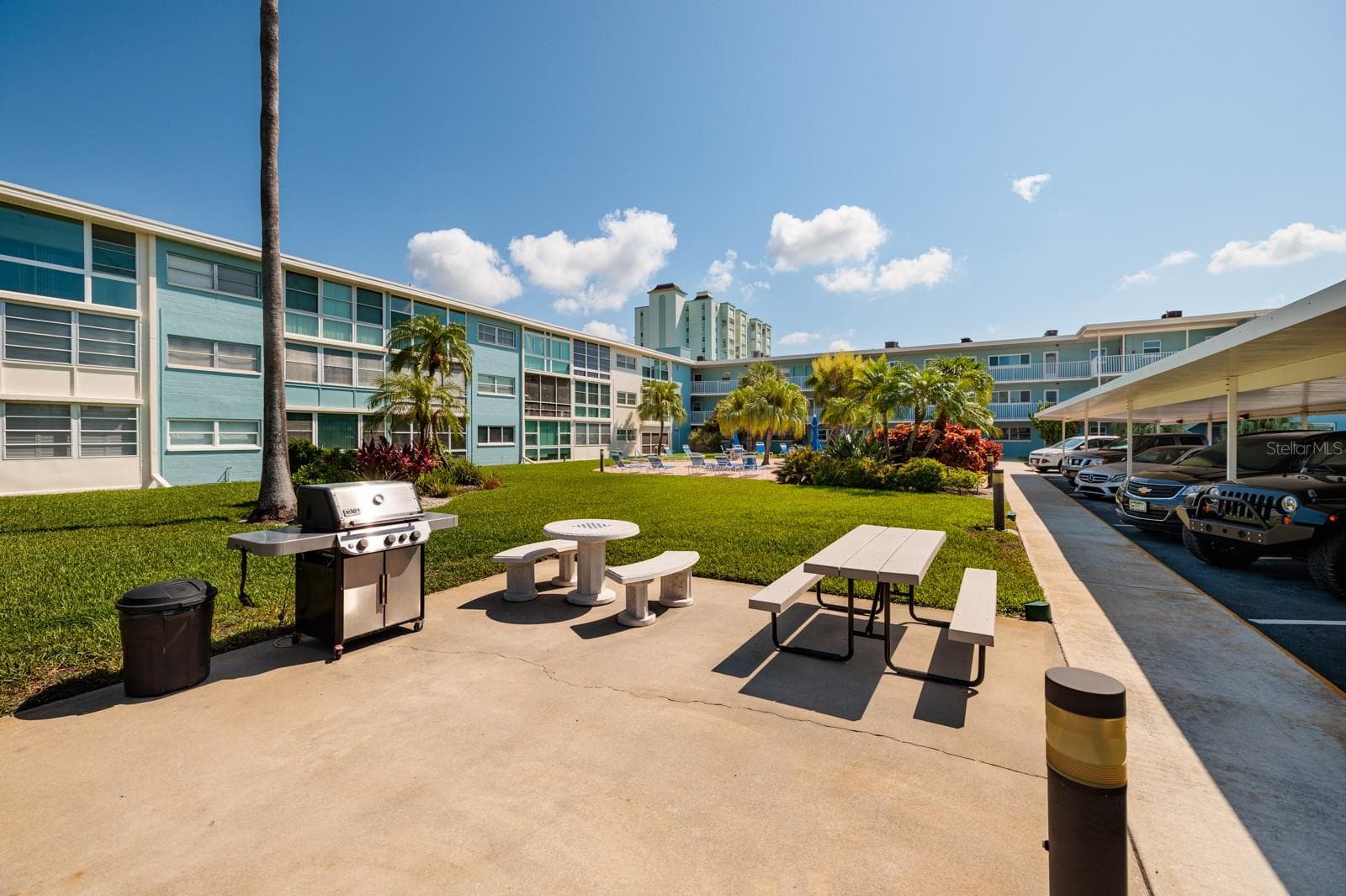 Grilling area across from unit bldg. - 6161 GULF WINDS DR #338, ST PETE BEACH