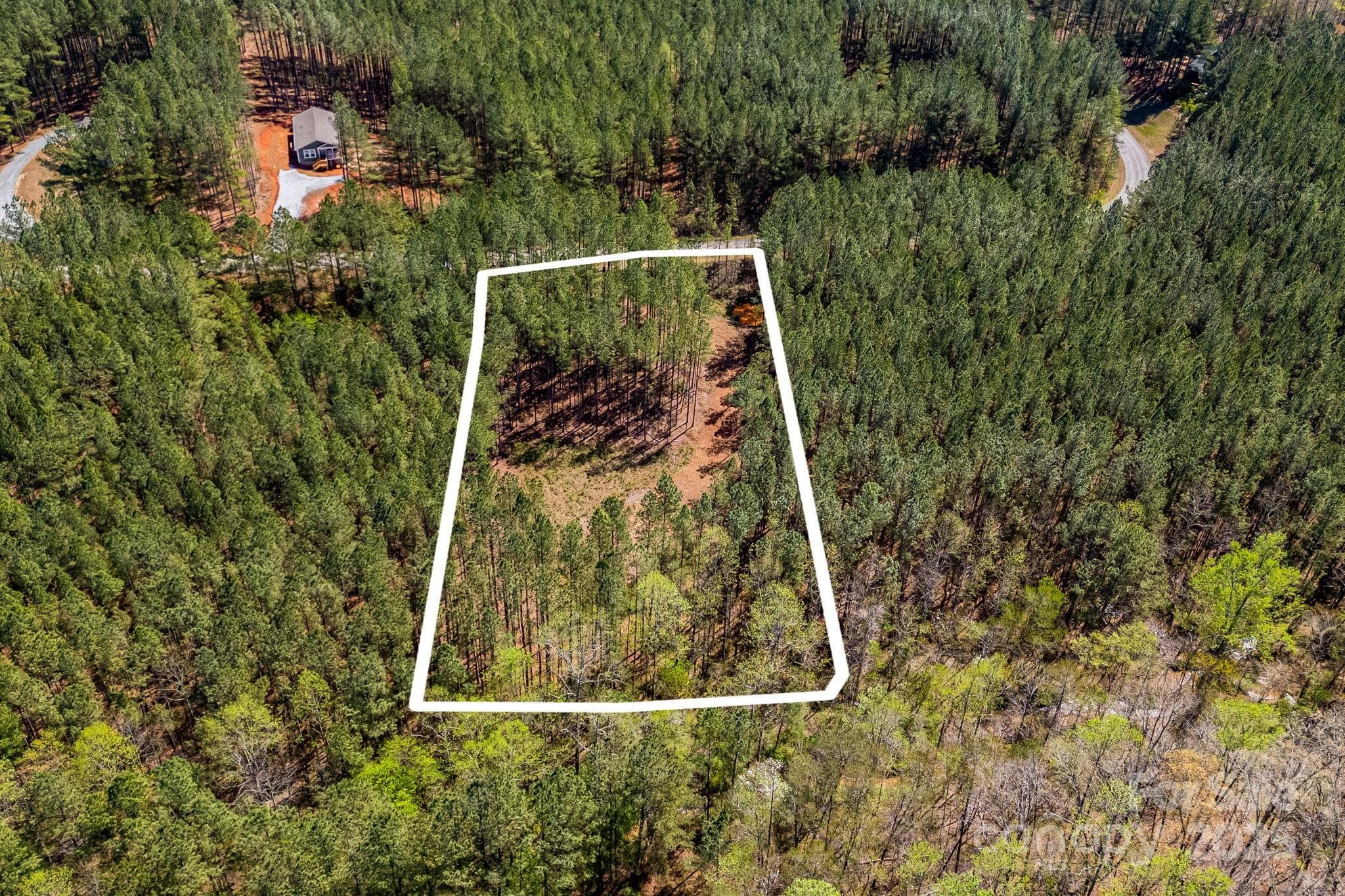 Aerial view- lot lines are approximate. - Mill Spring