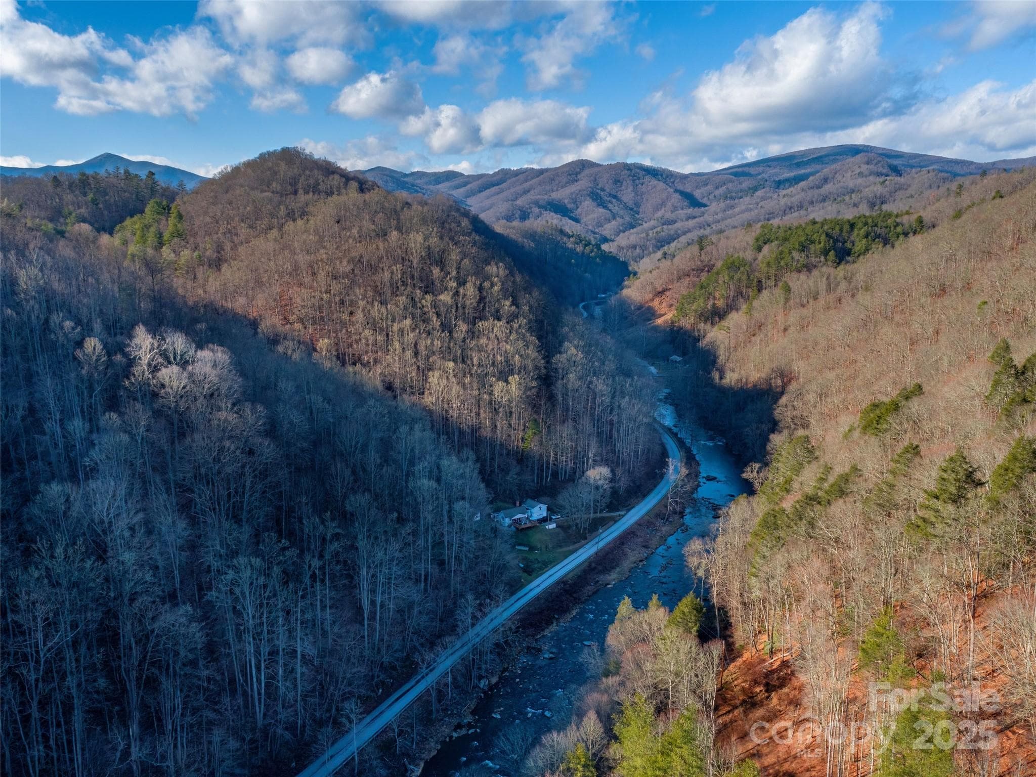 Drone shot of house surrounded by 62 acres of Appalachian Mountains! - Burnsville
