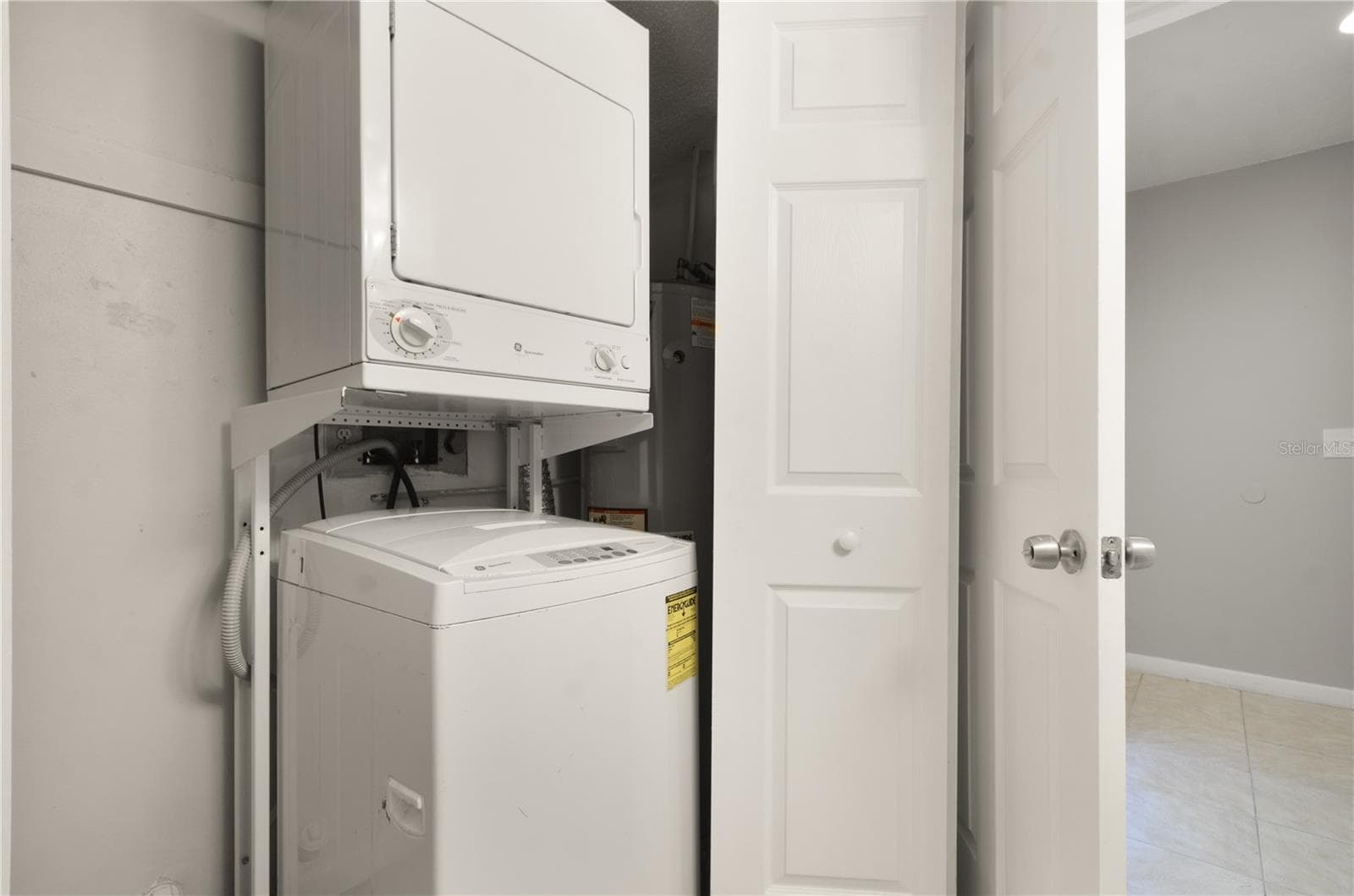 inside laundry closet - 6114 PEREGRINE AVE #D03, ORLANDO