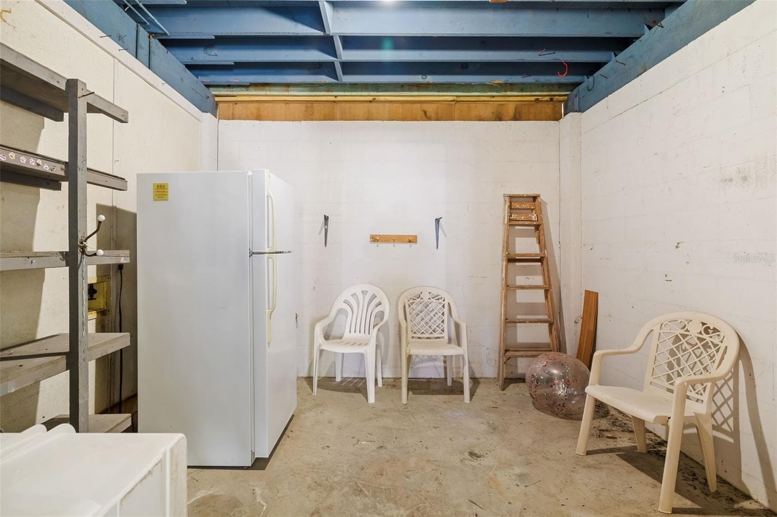 Storage / Utility RoomGround-level storage space ideal for beach gear, bikes, and additional storage needs. - 2513 AVENUE B #B, BRADENTON BEACH