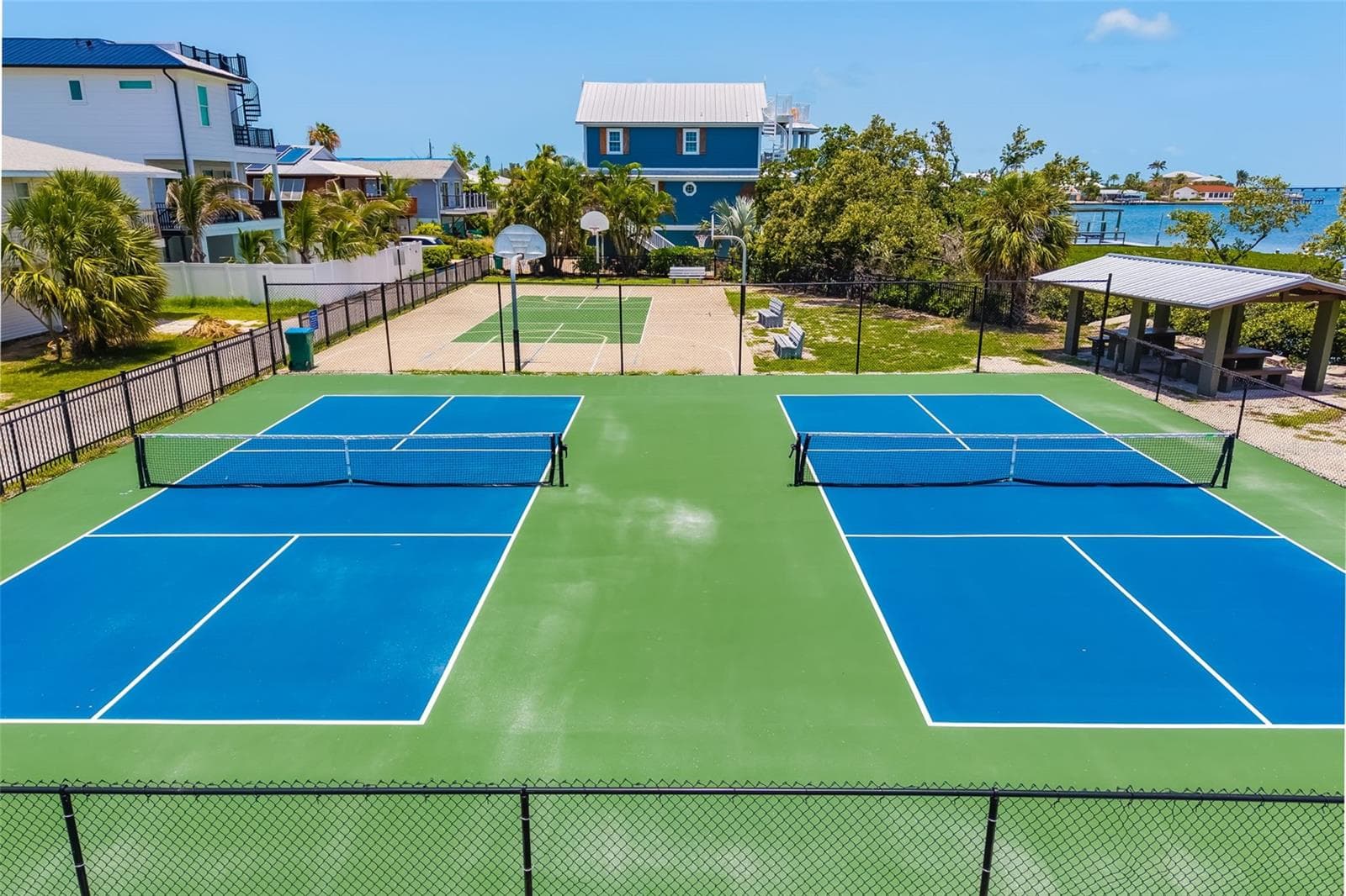Recreation area with pickleball and basketball courts alongside Sarasota Bay. - 2513 AVENUE B #B, BRADENTON BEACH