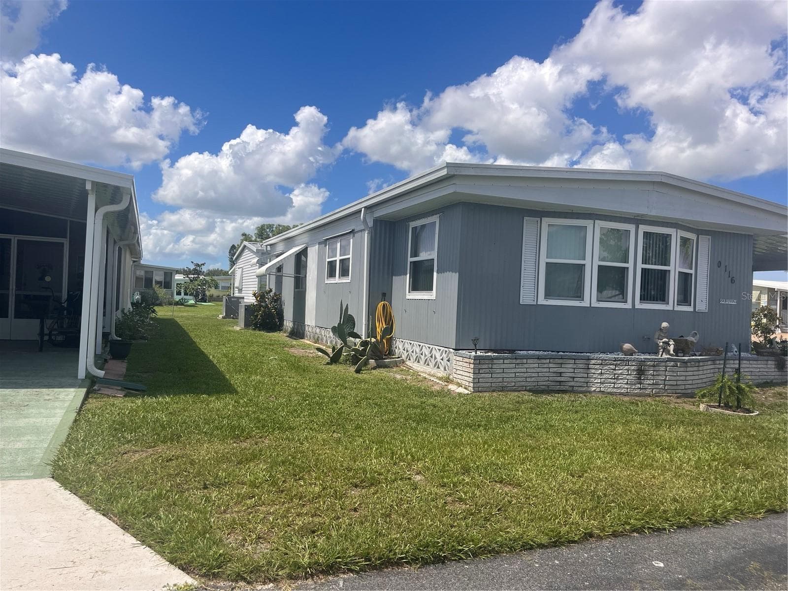 Manufactured Home at 5316 53RD AVE E #Q116, BRADENTON, photo 3 of 36