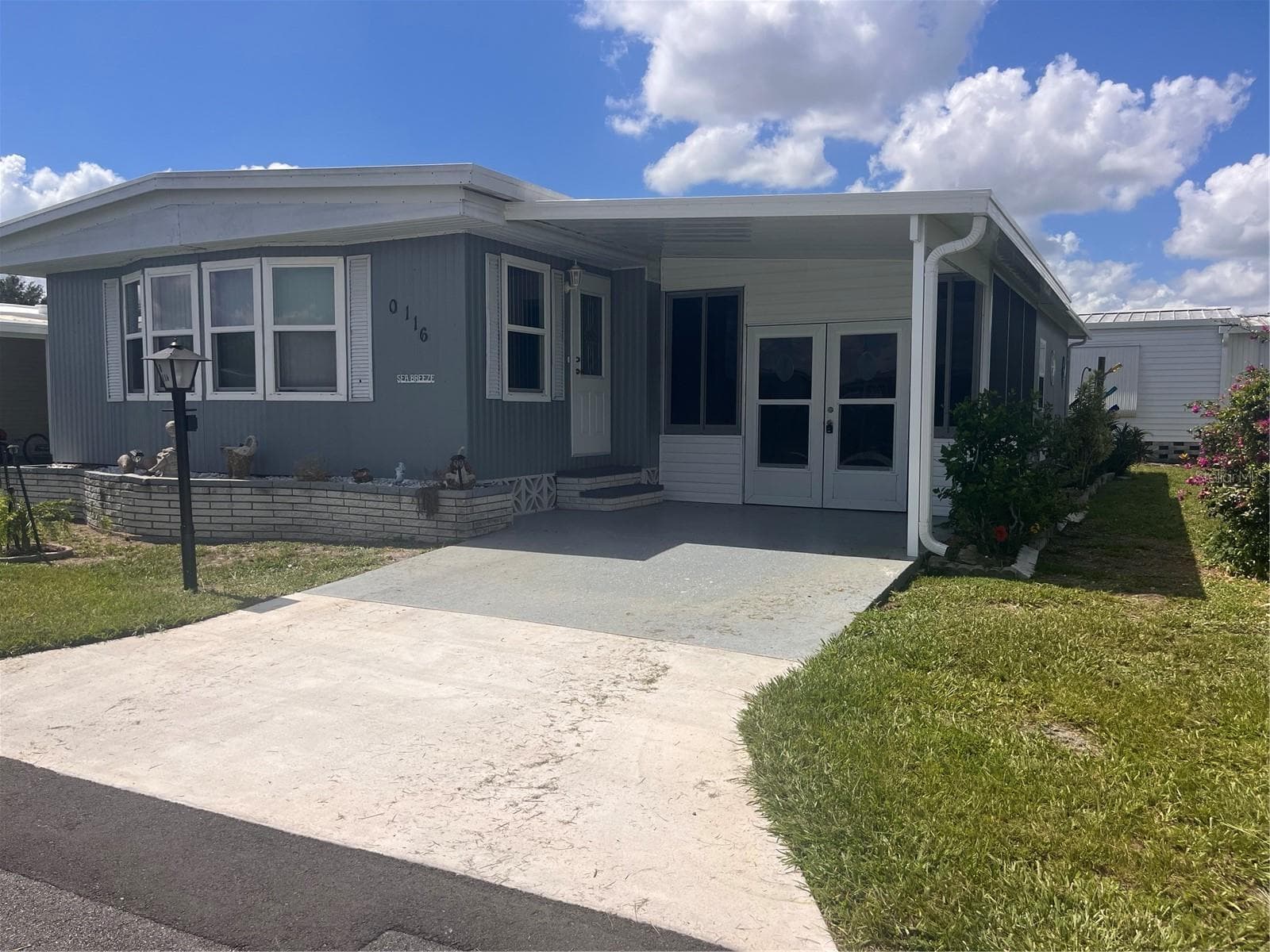 Manufactured Home at 5316 53RD AVE E #Q116, BRADENTON, photo 4 of 36