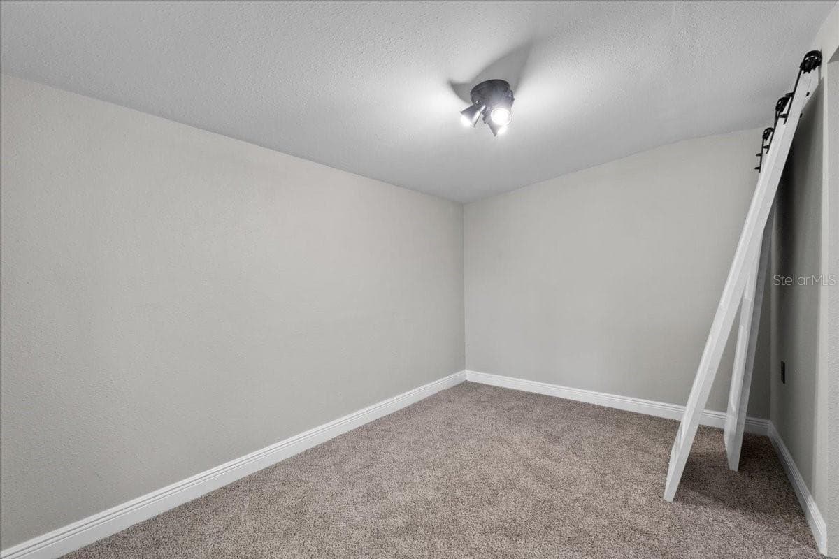 Primary Walk in Closet. Barn door will be installed - 504 PRADO PL, LAKELAND