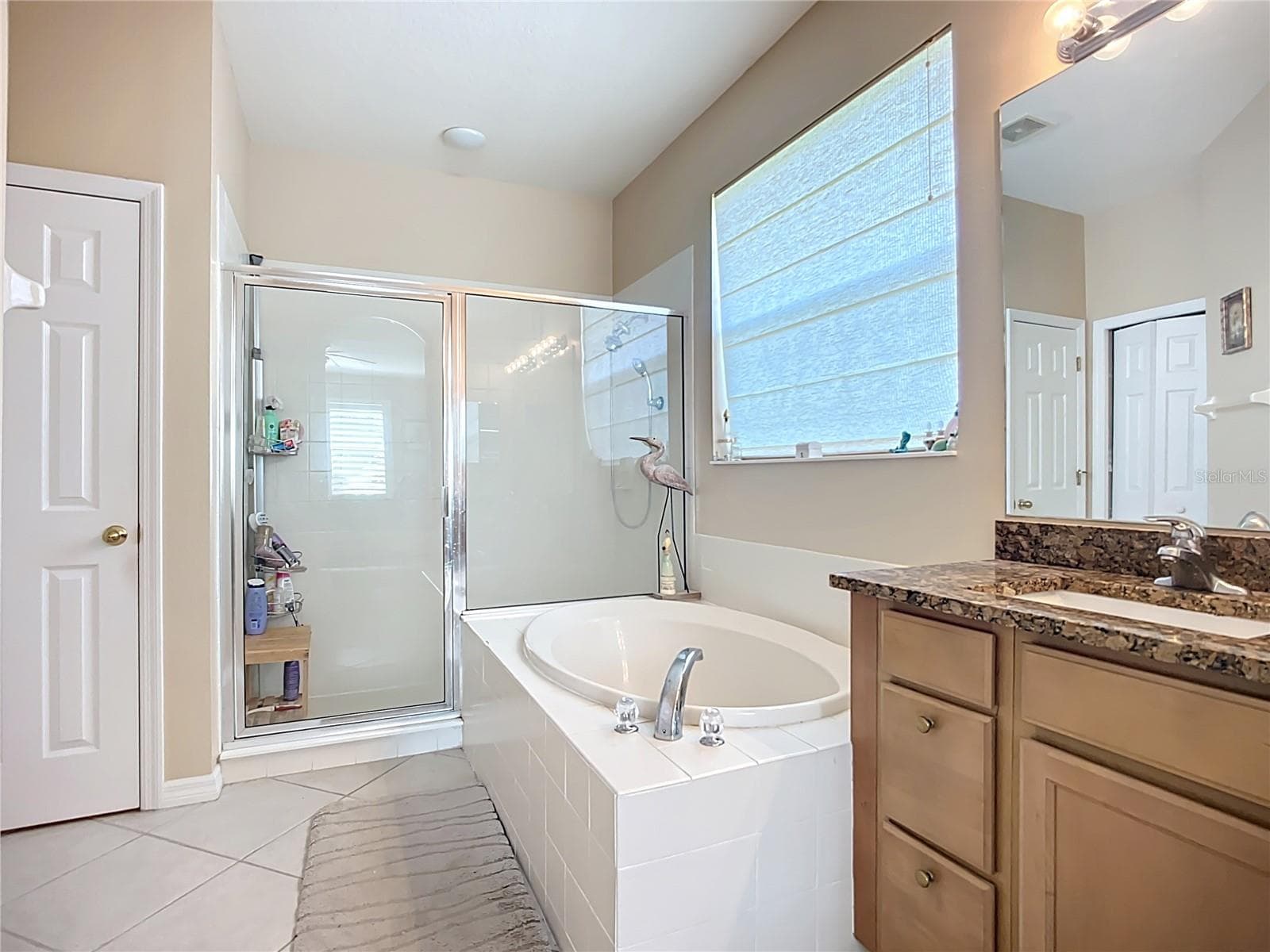 Walk-in closet is located in the bathroom. - 3409 61ST TER E, ELLENTON