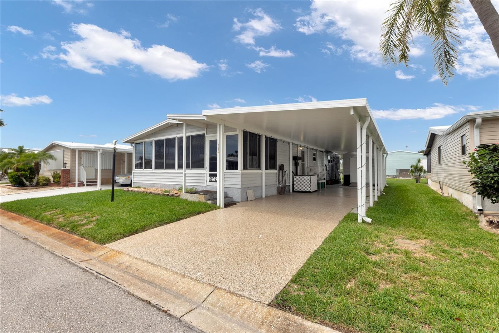 Manufactured Home at 2100 KINGS HWY #1052, PORT CHARLOTTE, photo 2 of 63
