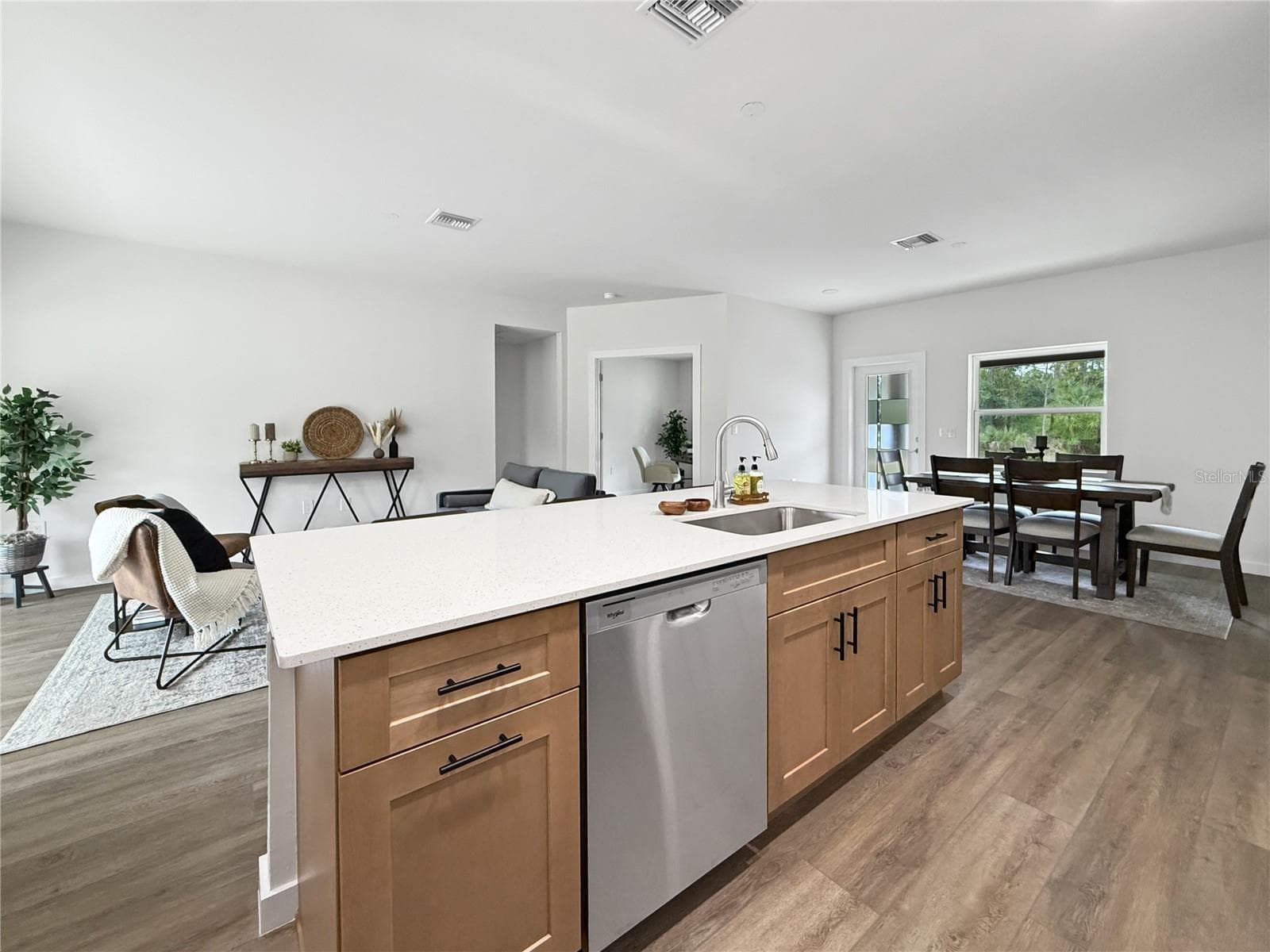 View from Kitchen overlooking Living & Dining - 73 BARSTOW ST, PORT CHARLOTTE