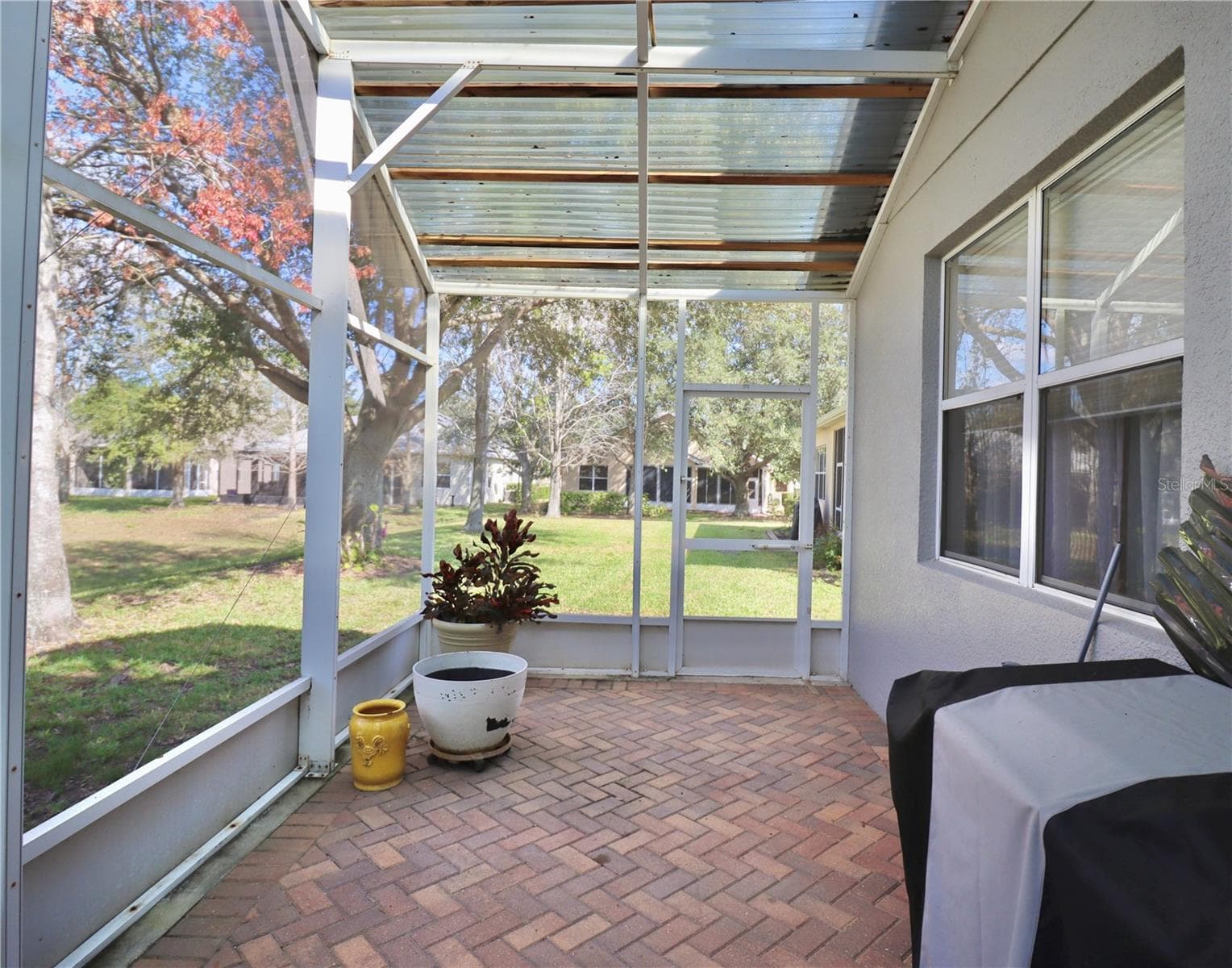 Extended porch - 119 CRESCENT MOON DR, GROVELAND